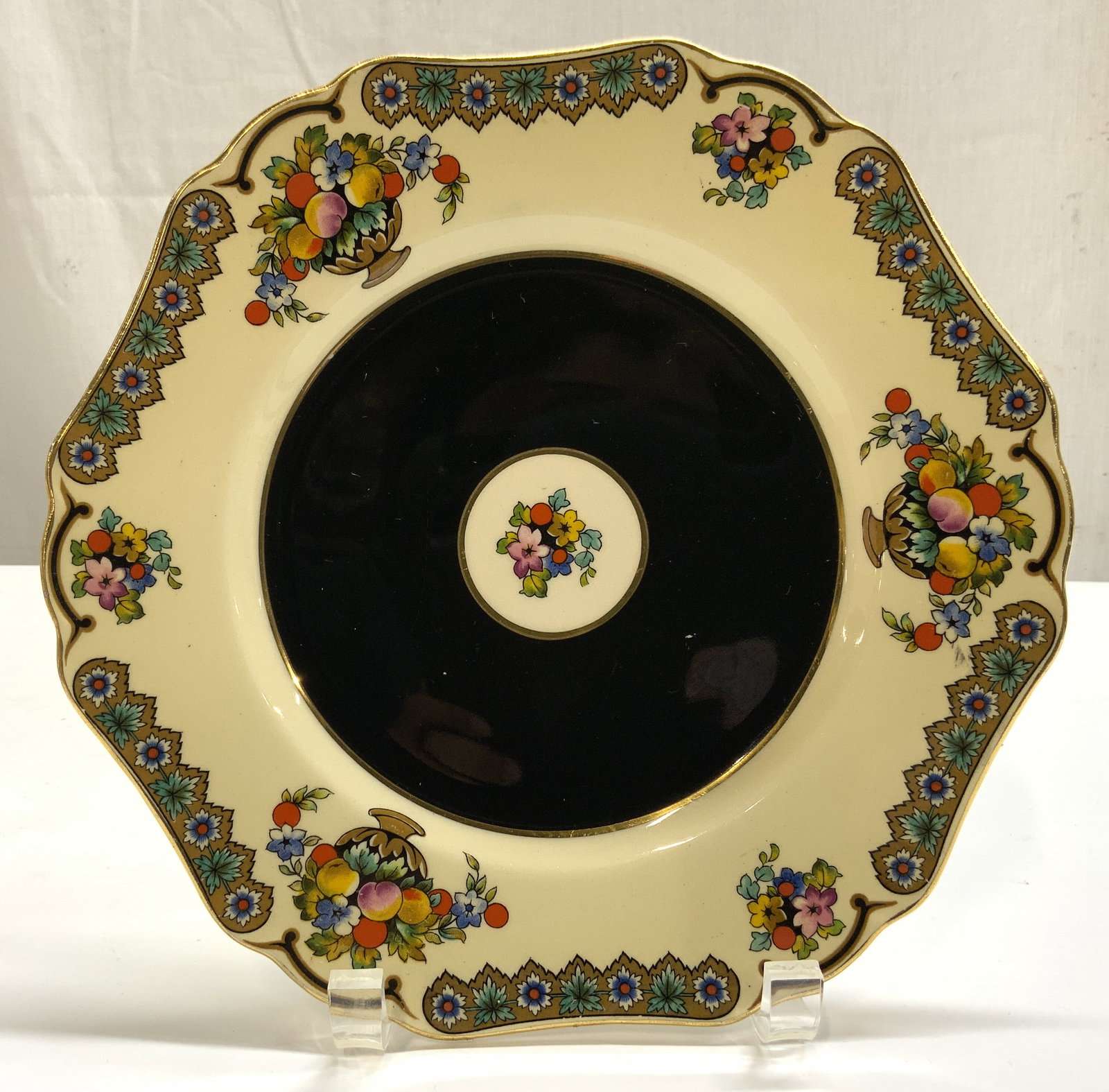 Antq John Maddock & Sons Jersey Minerva Plate, Eng: Antique John Maddock & Sons Jersey Pattern Black Center Minerva Plate. made in England. Royal ironstone. Art deco. Bold glossy black circular center band surrounding central floral medallion. Cream ri