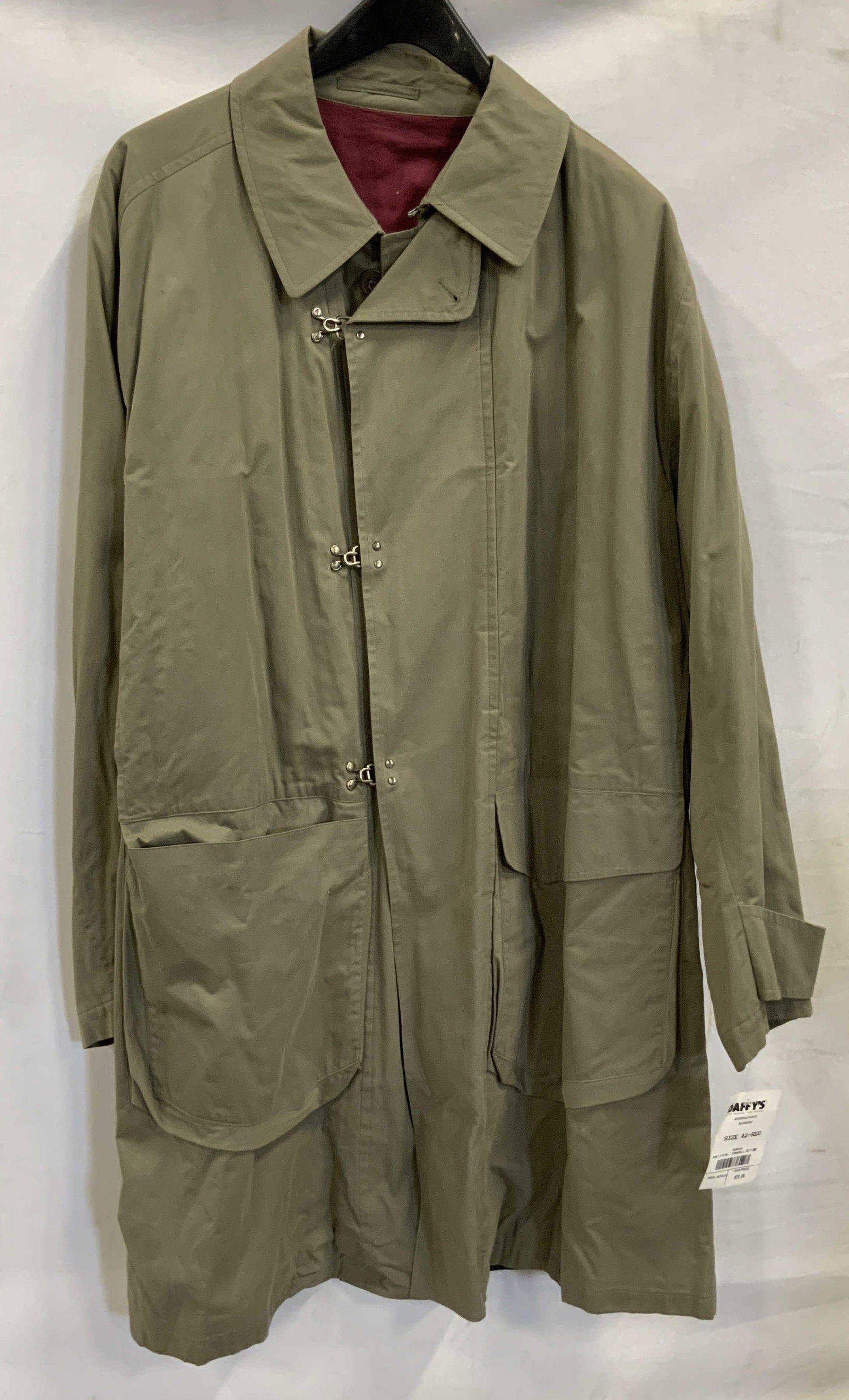 Larusmiani cotton hook clasp raincoat. NWT Italy: Larusmiani cotton hook clasp raincoat made in Italy . New With Tags. 100% cotton exterior, cotton polyester blend fleece interior. Button and hook and clasp closure. Interior zipper pockets. Size 42.