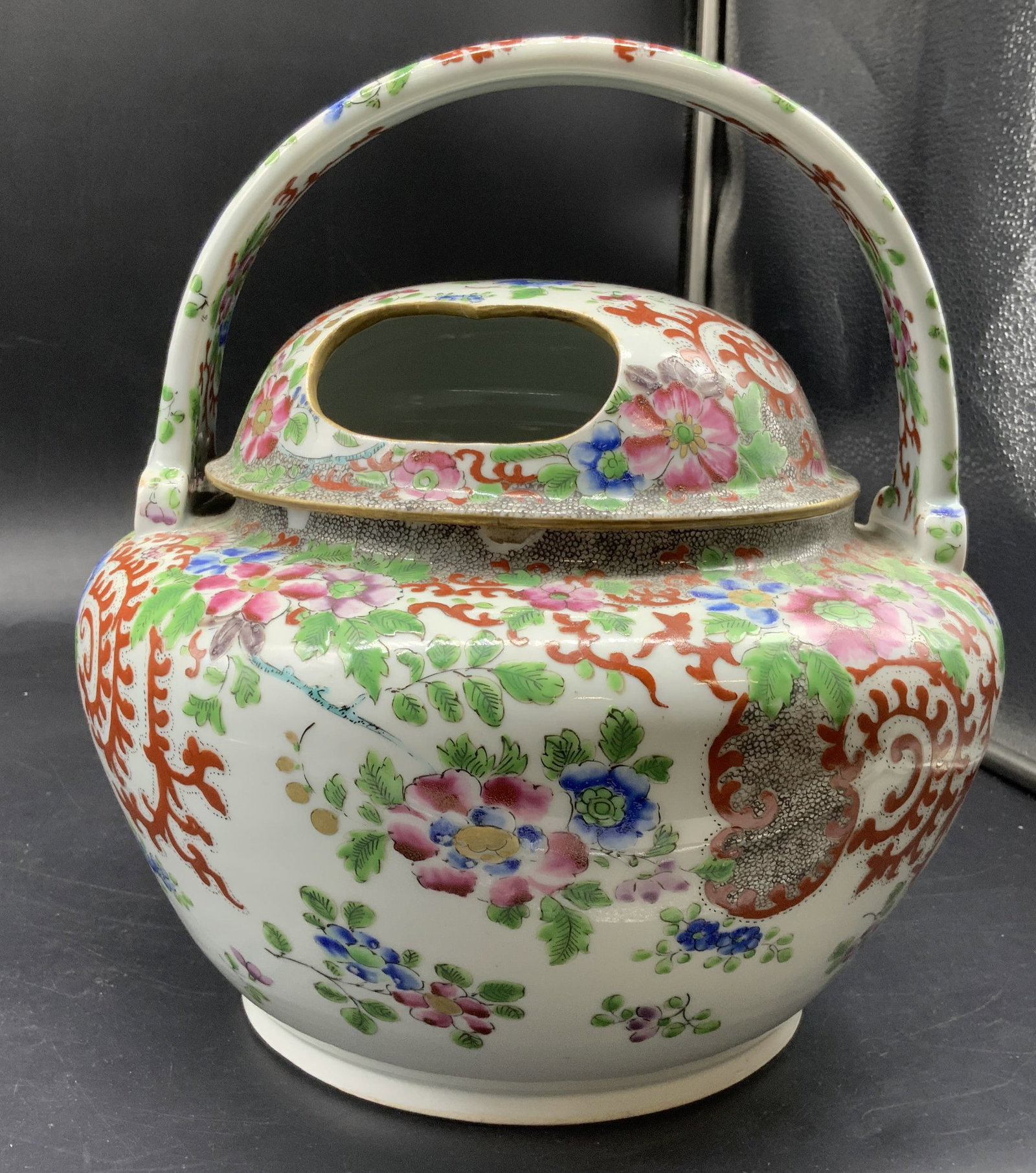 Antique Large Chinese Porcelain Pot: Antique Chinese Famille rose porcelain pot, possibly once for tea, , 19thC associated w QING dynasty, features hand painted floral motifs and a distinctive domed lid with a unique cut out design and a