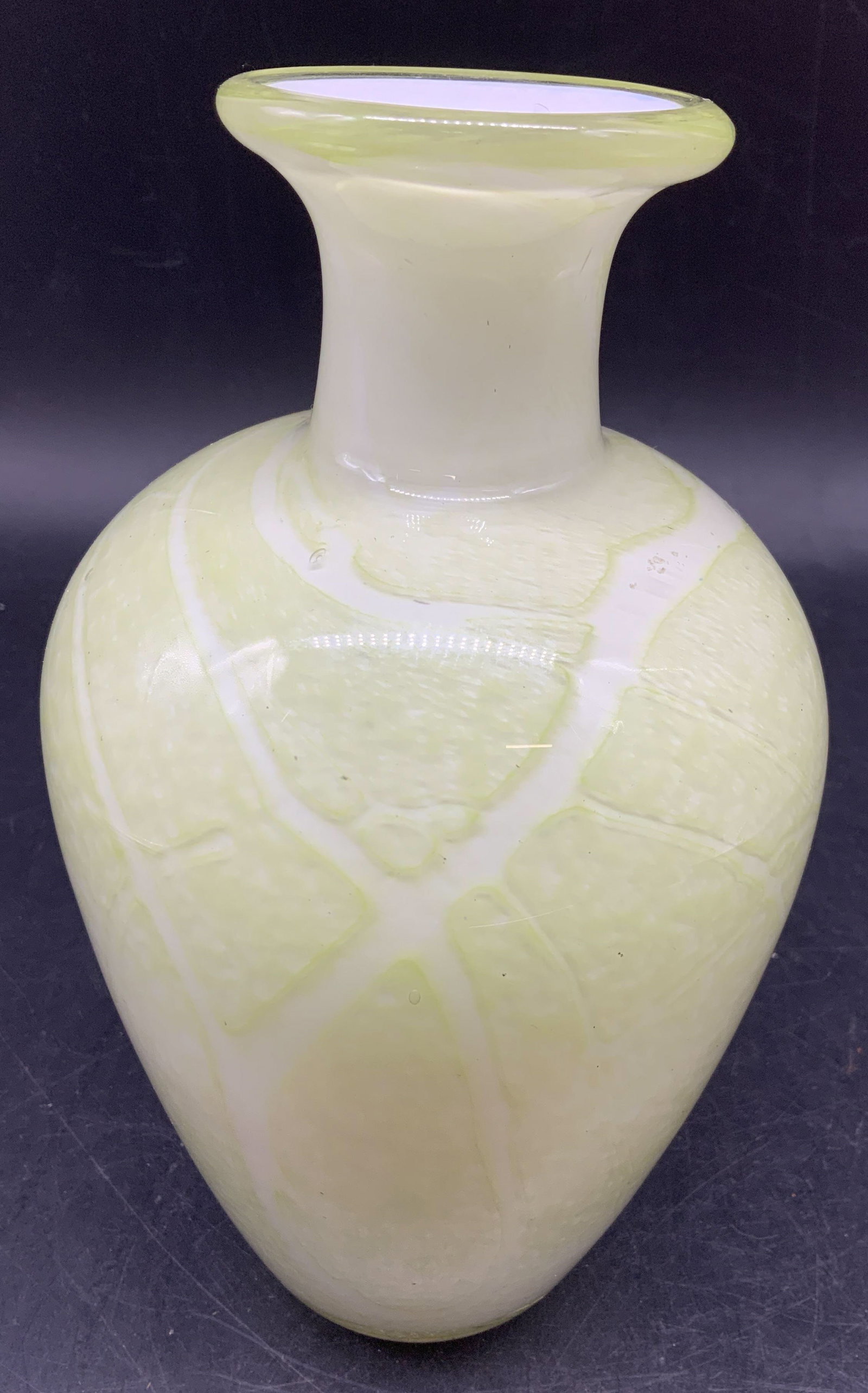 Vntg Yellow Green Art Glass Vase: Thick walled art glass vase with yellow green color and white veining, interior is a contrasting crisp white, possibly Italian, measures ht app 9 inches, diameter app 5 inches