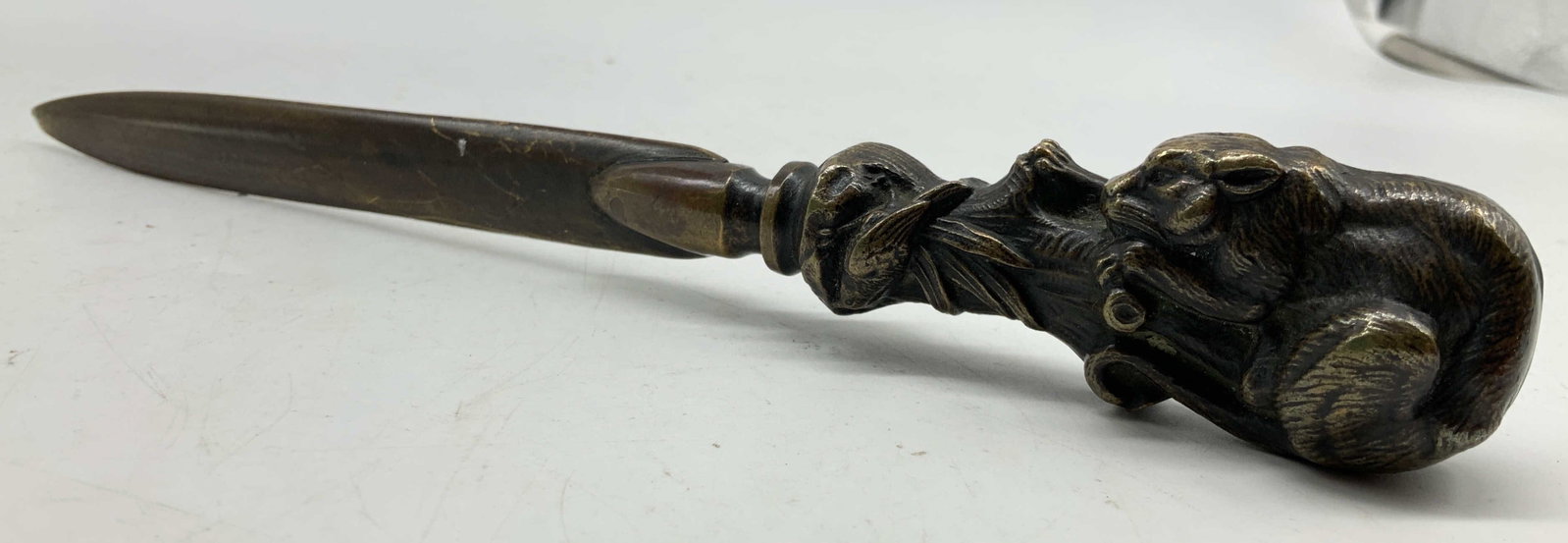 Vntg Bronze Monkey Figural Letter Opener: Heavy bronze letter opener, dagger, with ornate handle of a perched crouching monkey, possibly a jungle cat with curled tail, possibly 19th century, ornate figural handled letter opener, measures leng