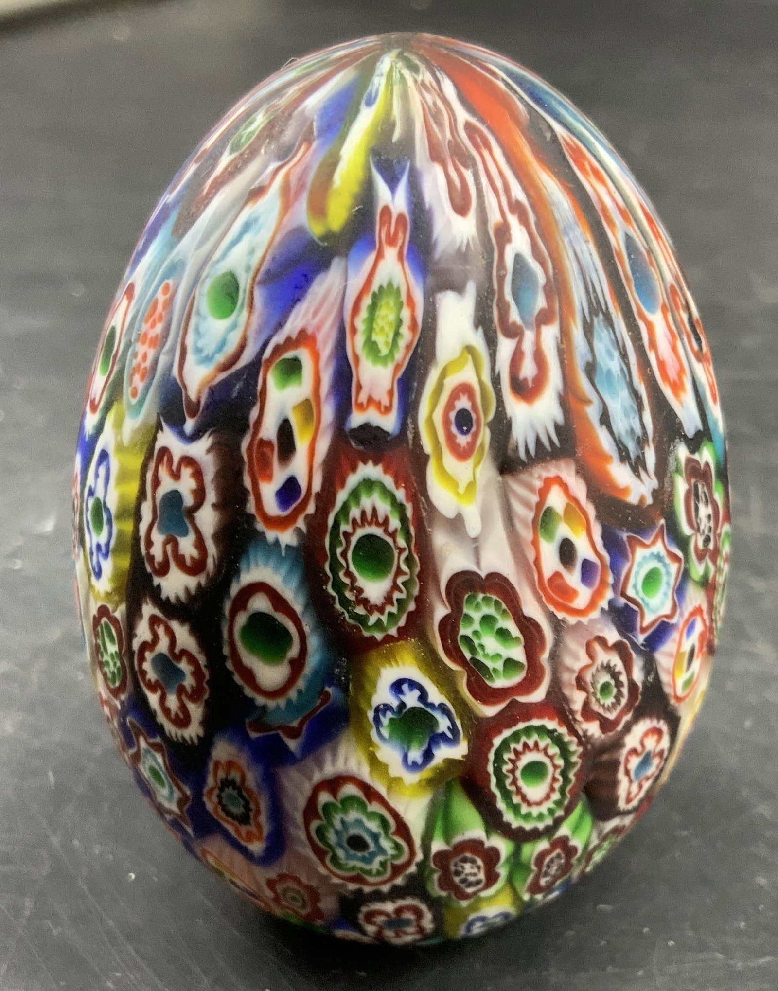 Vntg Murano Art Glass Paperweight, Italy: Vintage MURANO Art glass paperweight in egg shape, featuring a colorful millefiori pastern, created by embedding small glass canes, hand crafted Italian art glass measures ht app 3 inches diameter app