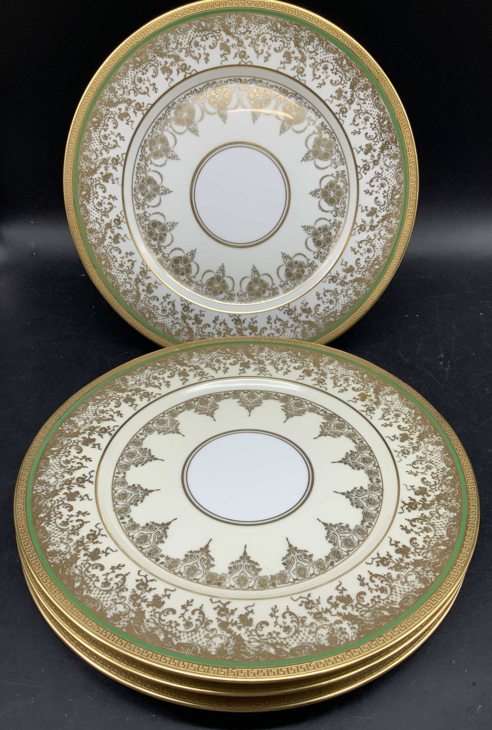 Antq Set 4 Heinrich Co Gold Encrusted Platters: Antique set of 4 Heinrich & Co Porcelain platters featuring .heavy gold encrusted decoration and a green Greek key border, each measures diameter app 11 inches, all marked and stamped verso, porcelain