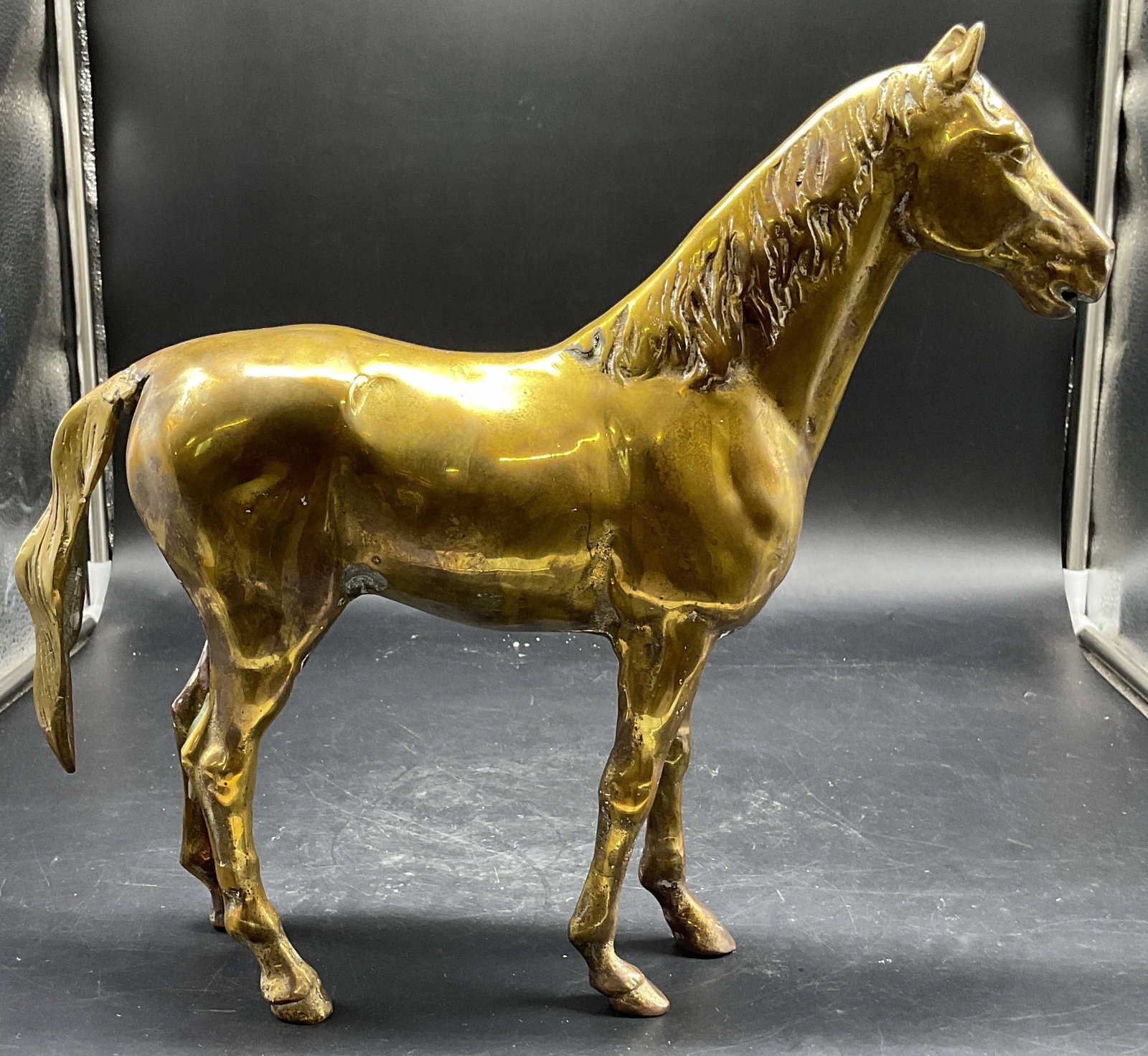 Heavy Brass Equestrian Horse Sculpture: Heavy solid Brass Equestrian Horse Sculpture, detailed etched mane and tail, measures ht 13 inches, length app 14.5 inches width app 4 inches