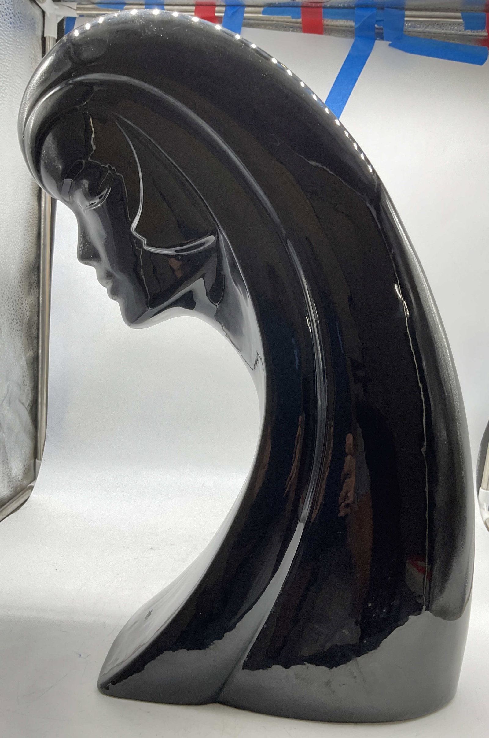 HAEGER glossy Ceramic Art Deco Head: Haeger label affixed to underside, art deco highly stylized bust of a female, featuring glossy black finish glazed ceramic, , female has long waterfall style hair measures ht app20 inches width app
