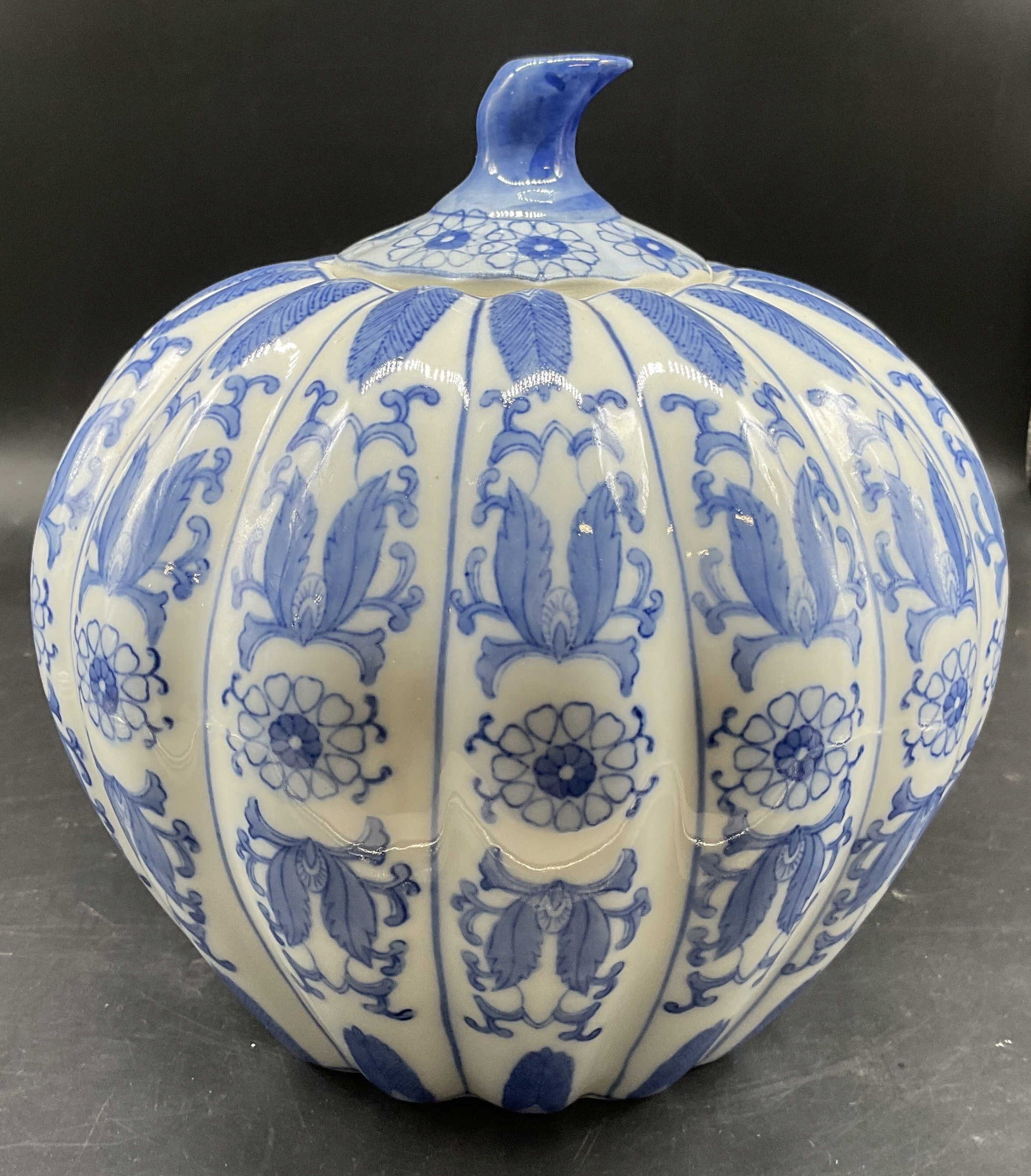 Chinoiserie Blue White Porcelain Lidded Pumpkin: Blue white porcelain lidded pumpkin vessel, label on underside reads LOD and Taylor, bygone luxury department store, porcelain ceramic, pumpkin form hand painted blue and white geometric design,