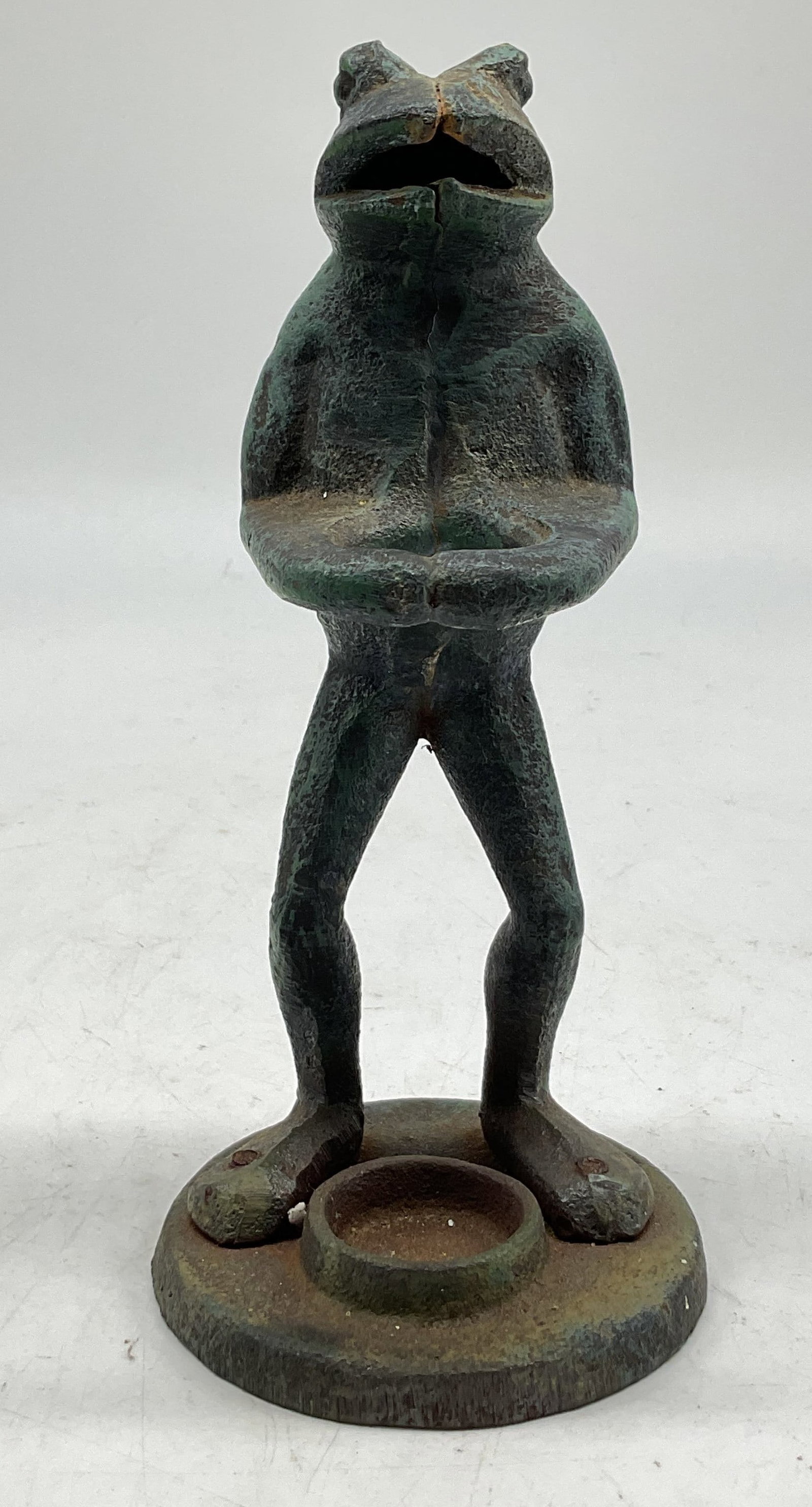 Vintage Cast Bronze Verdigris Frog Figural: Vintage cast bronze verdigris frog figural. Patinated. Standing frog figure with its arms meeting in the middle. Stands on a round base with a fitted compartment. Measures ht approx 7 inches diam appr