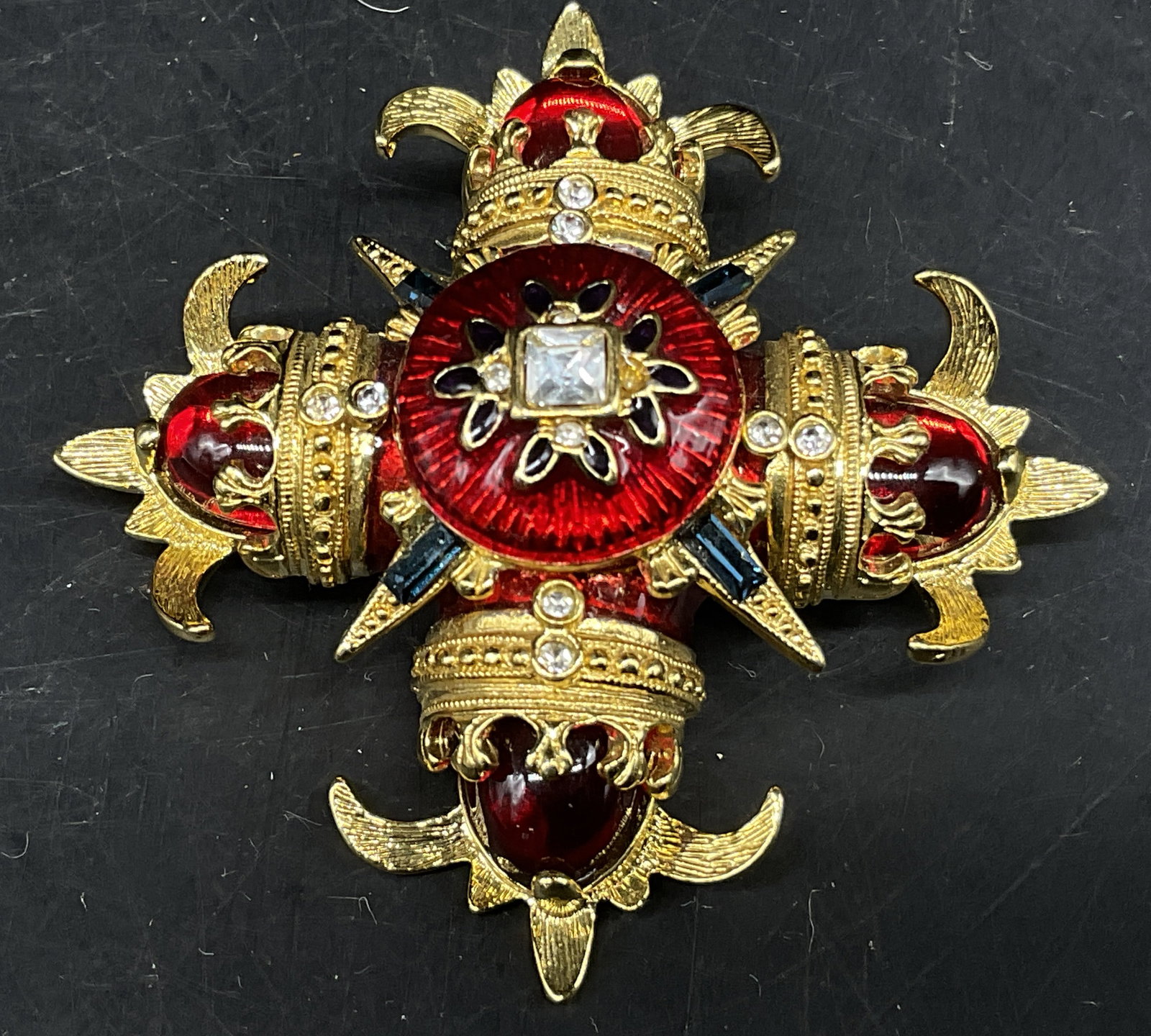VINTAGE 98 Graziano Maltese Cross Brooch: Vintage 1998 Graziano Gold-Toned Maltese Cross Brooch. Red Enamel Accents. Smooth Poured Glass Red Cabochons at Four Tips. Square Rhinestone in Center. Vintage Brooches, Graziano, Maltese Cross, Ename