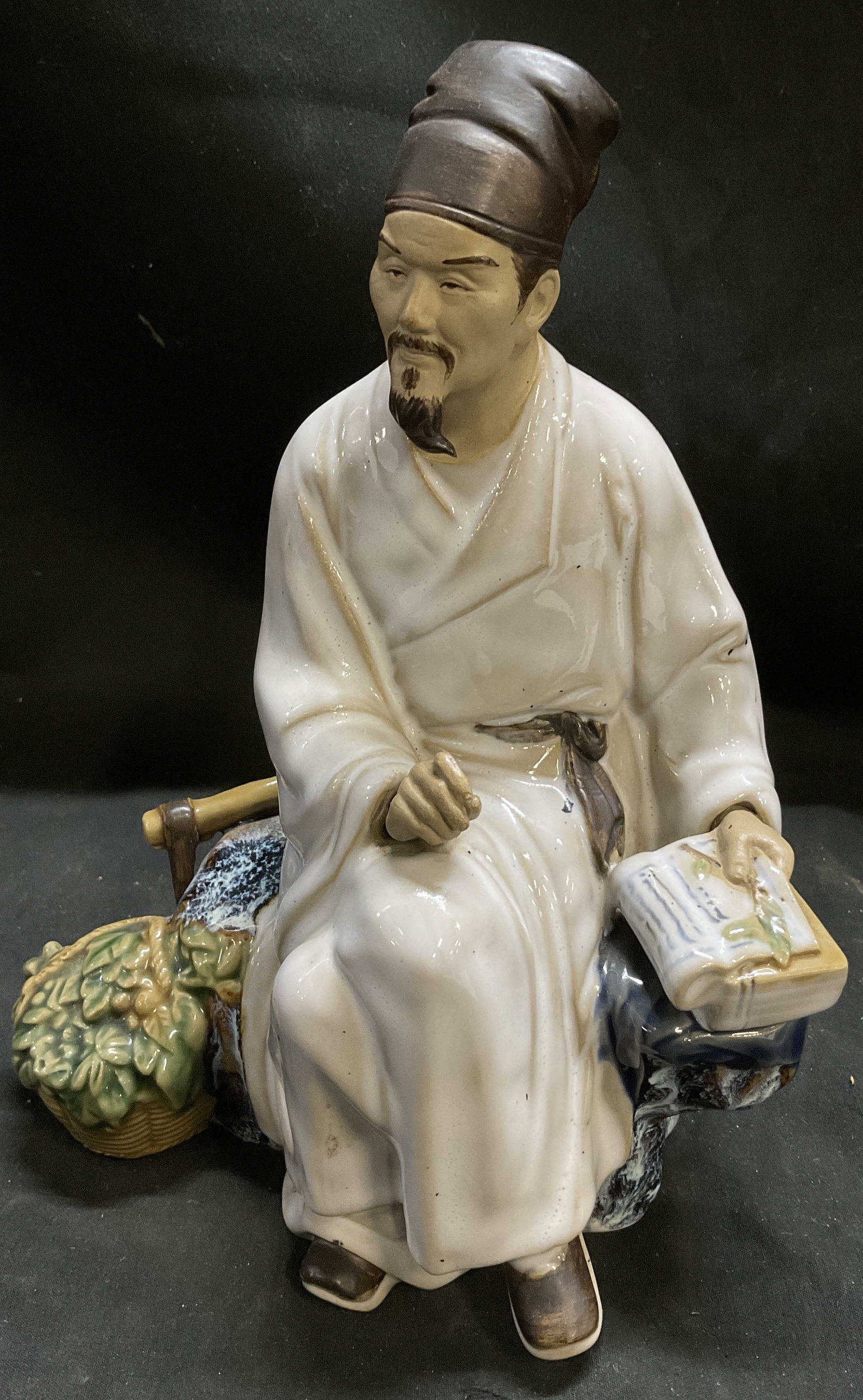 VTG Chinese Shiwan Pottery Li Shizhen Figurine: Vintage Chinese Shiwan Pottery Figurine. Glazed Clay Art Sculpture of Li Shizen, Author of Compendium of Materia Medica Sitting on Rock Formation and Holding Herbal Records Book. Basket of Medicinal P