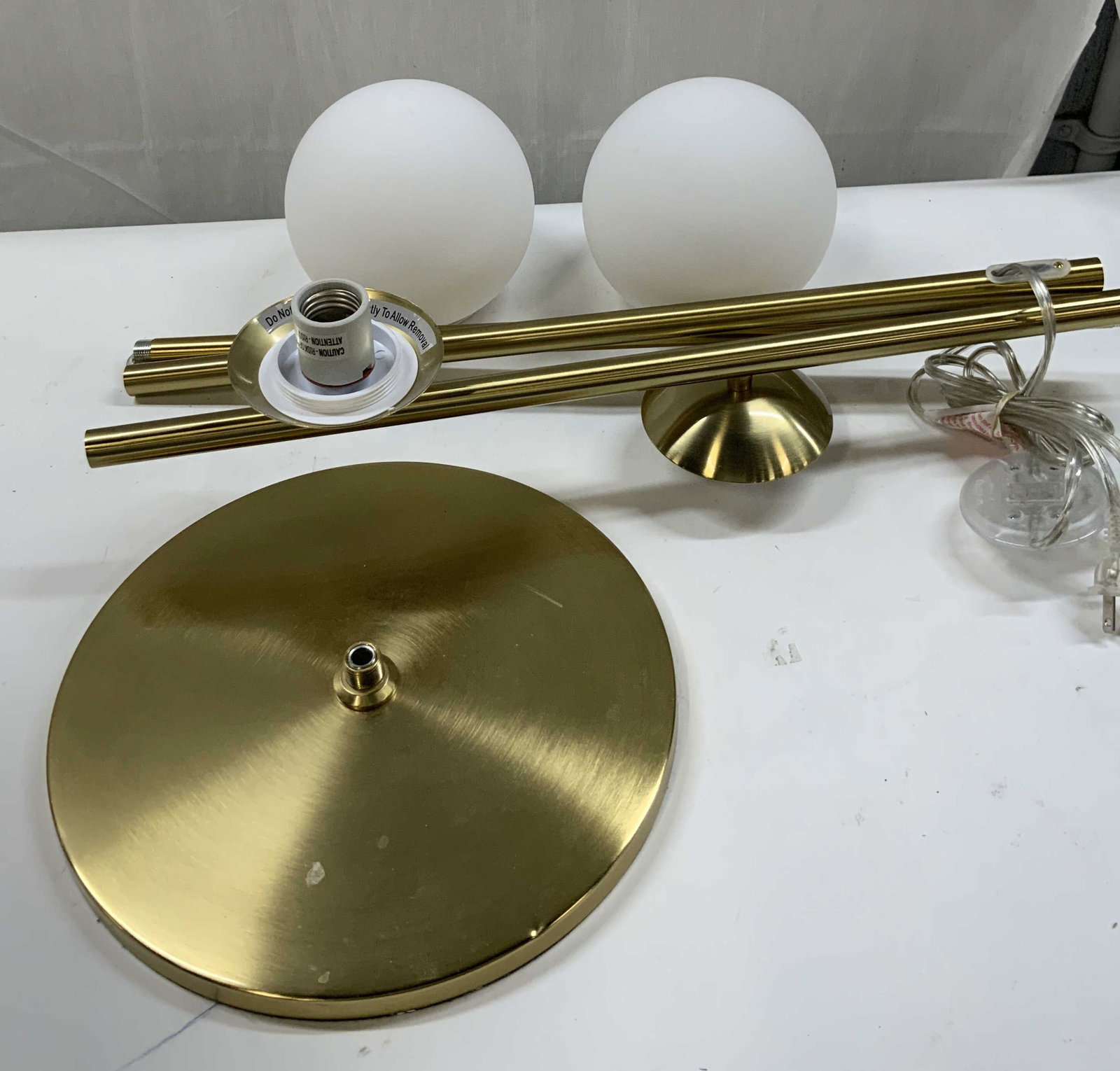 Goodly Light Technology floor lamp 2020: Goodly Light Technology floor lamp. Modern frosted glass globe floor lamp with two lights. Gold colored finish with 2 milk-glass globes. Also includes 2 light bulbs. Production date July of 2020. When