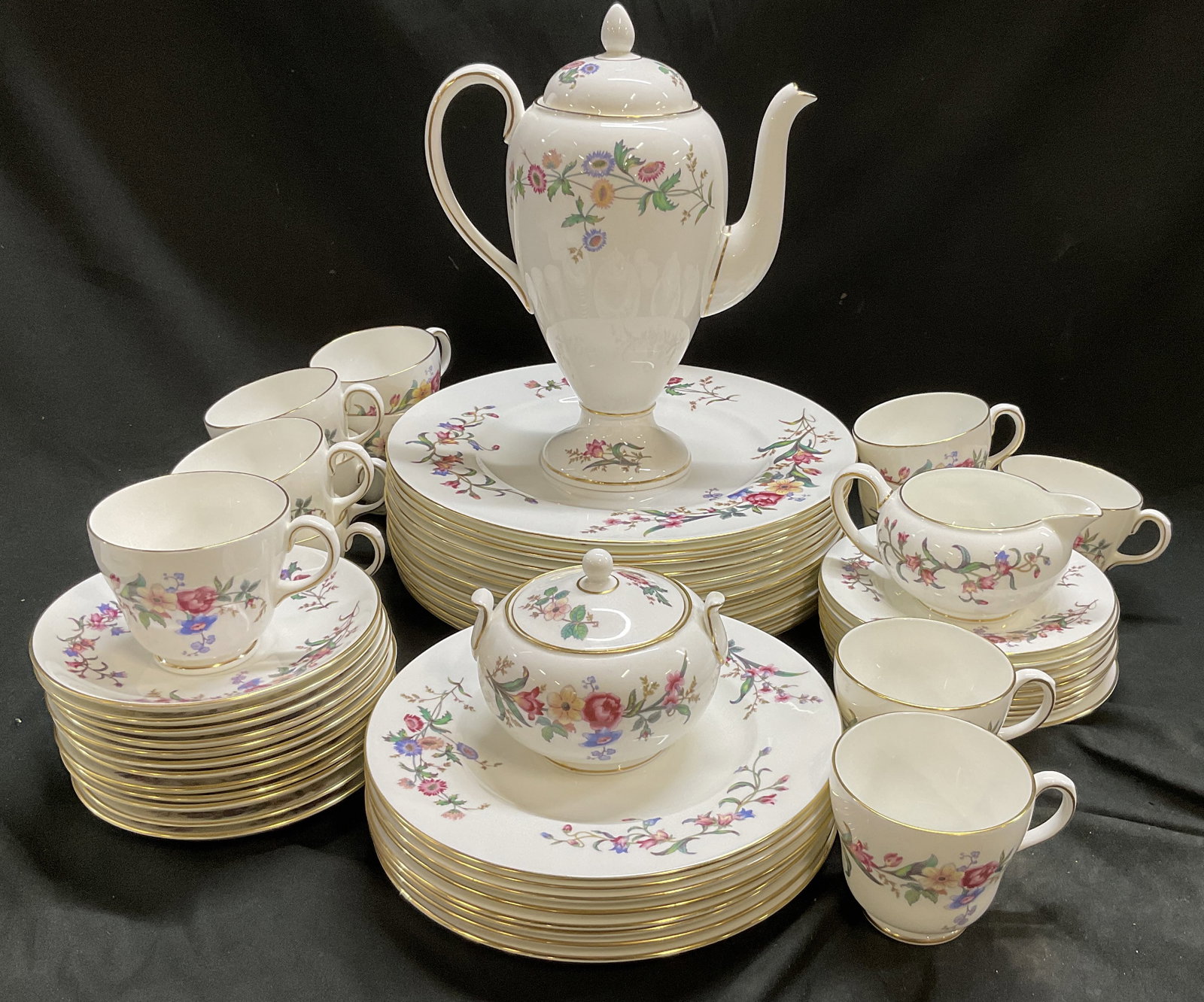 St57 VTG Wedgwood Devon Sprays China Set ENGLD: Set of 57 Vintage Wedgwood Fine Bone China Service Set. Pattern Number W4076 Devon Sprays. Vibrant Multi-Colored Floral Bouquets and Trailing Garden Vines on White. Gilt Trim. England. Includes 1 Teap