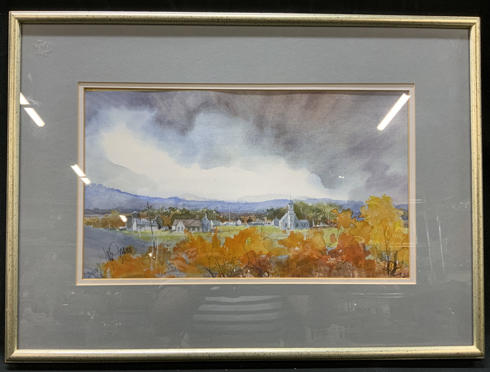 Vtg Signed Autumn Village Watercolor, Framed: Vintage Signed Autumn Village Watercolor, Framed Impressionist style landscape painting rendered in fluid washes of watercolor. Composition depicts a scenic country road bordered by autumn trees. Clus