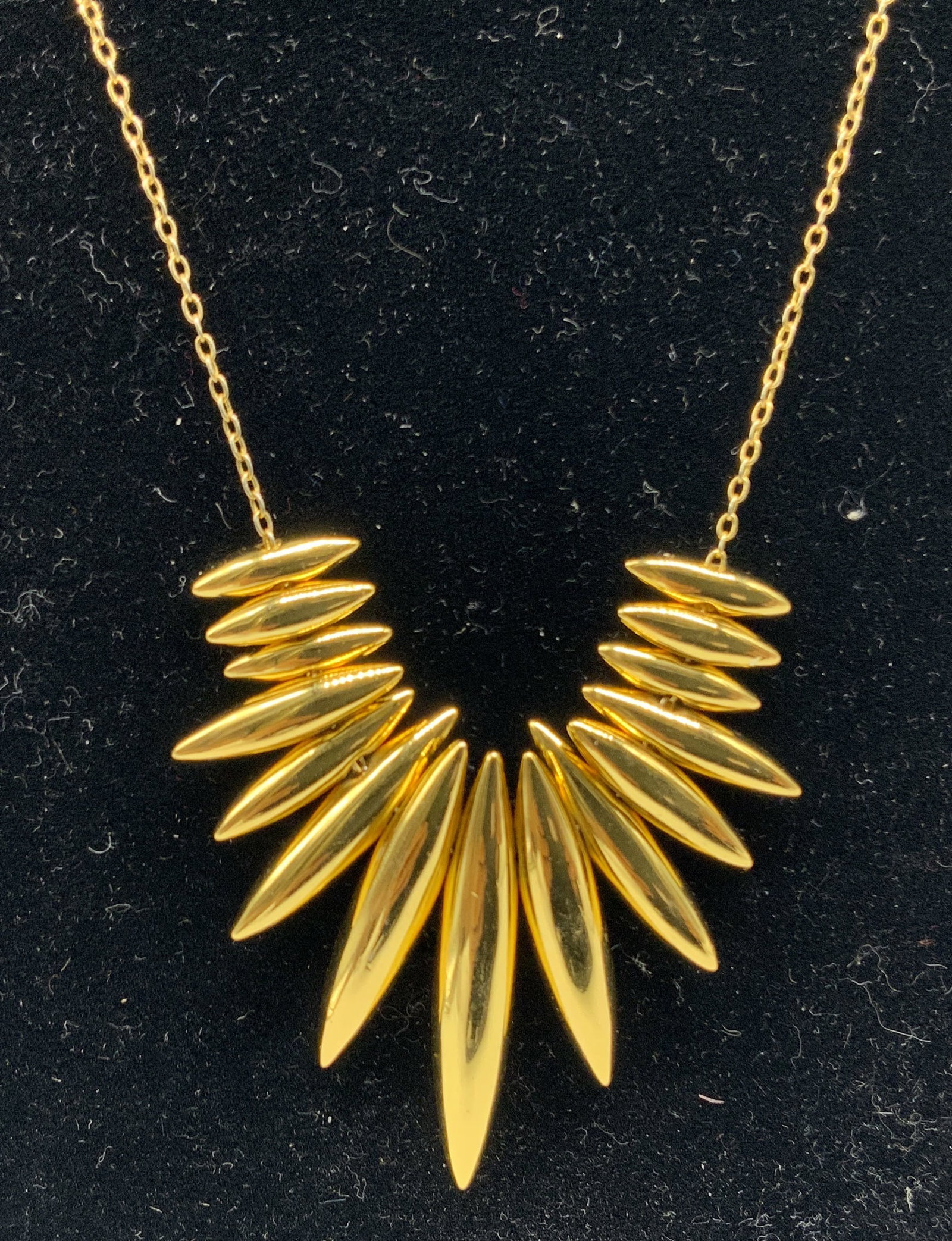 Gorjana Kylie Gold Tone Fan Fringe Necklace: Modern statement Kylie Gold Tone Fan fringe pendant necklace by Gorjana. Fringe centerpiece of graduated dagger spikes arranged in sunburst style pattern. Suspended from delicate gold plated link
