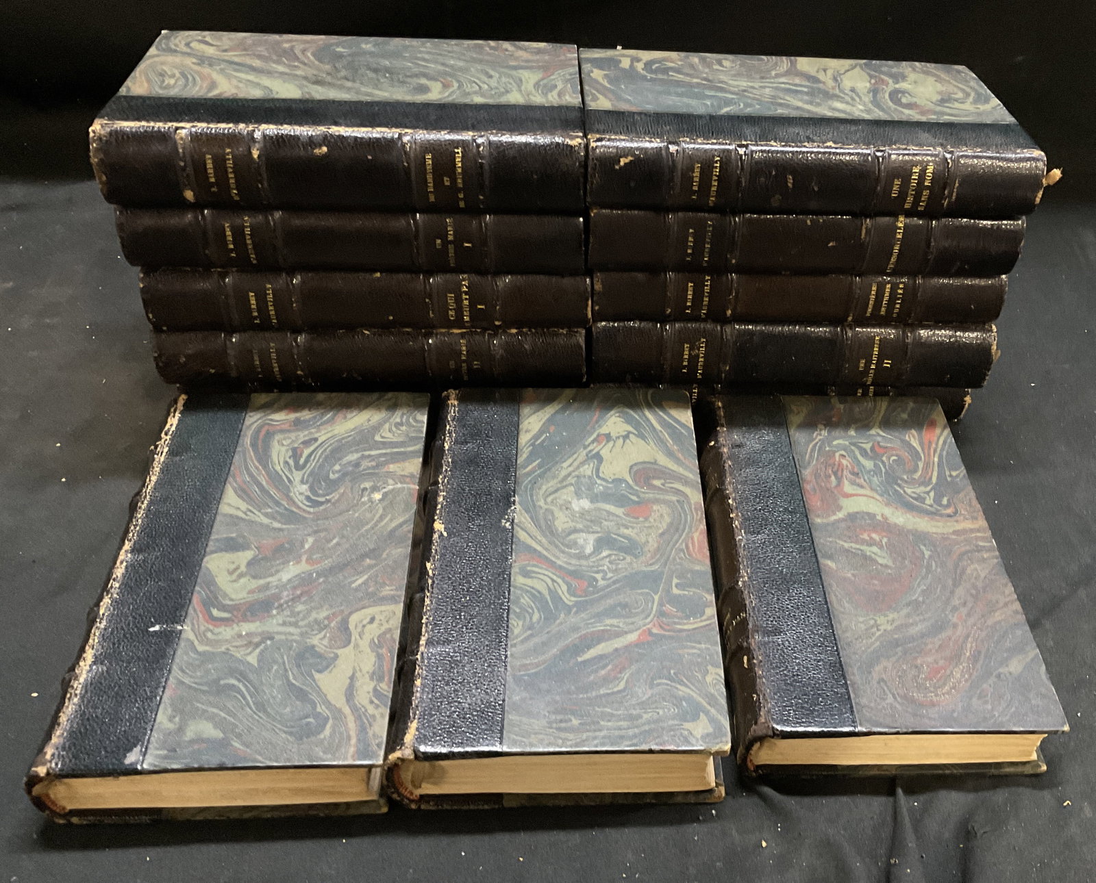 Lt13 ANTQ Oeuvres de J.Barbey DAurevilly Bks FRAN: 13 Antique 1926 Oeuvres de J.Barbey DAurevilly Books. Collected Works of Jules Barbey DAurevilly. Published by Librairie Alphonse Lemerre in Paris. Leather and Green Marbled Paper Bound. Fraying to Co