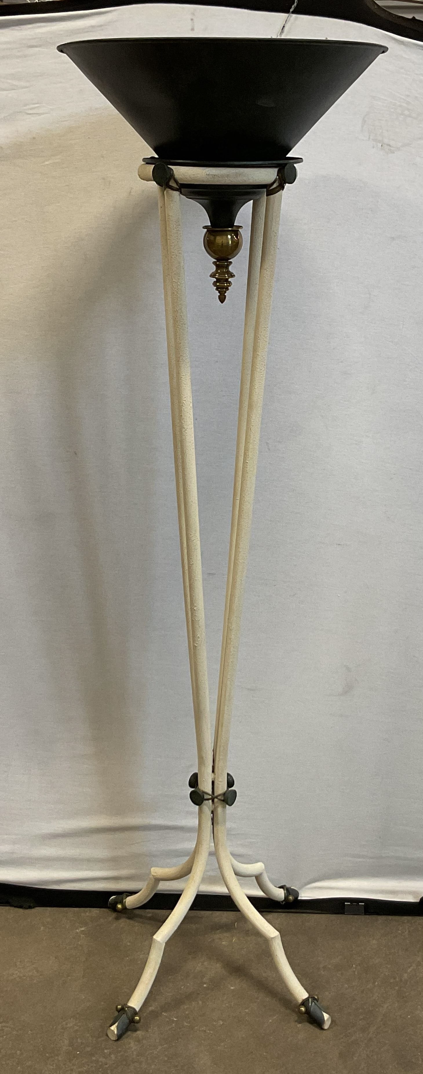 Mid Century Modern Metal Torchiere Floor Lamp: Mid century modern metal torchiere floor lamp. Slender multi rod white painted tripod base with a decorative brass accent. Black and green upright reflector bowl shade. Measures ht approx 54 inches di