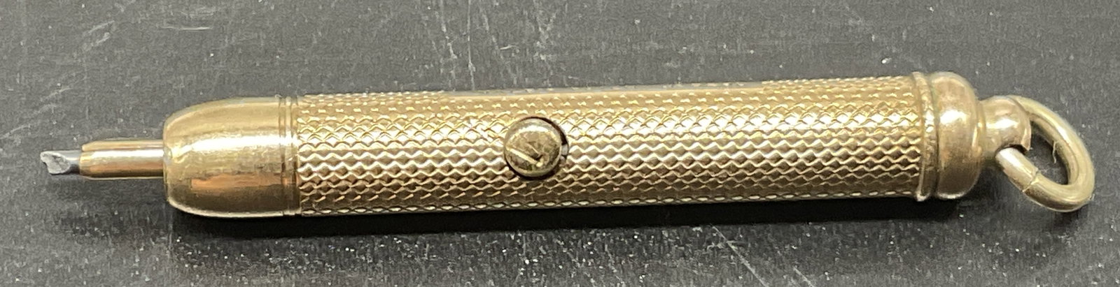 ANTQ Vales Gold-Filled Mechanical Pencil: Antique Victorian Vales Gold-Filled Mechanical Pencil with Button-Push Mechanism. Patent No.5298. Textured Engine-Turned Barrel and Suspension Ring to Attach to Belt Loop or Watch Chain. Antique Mecha