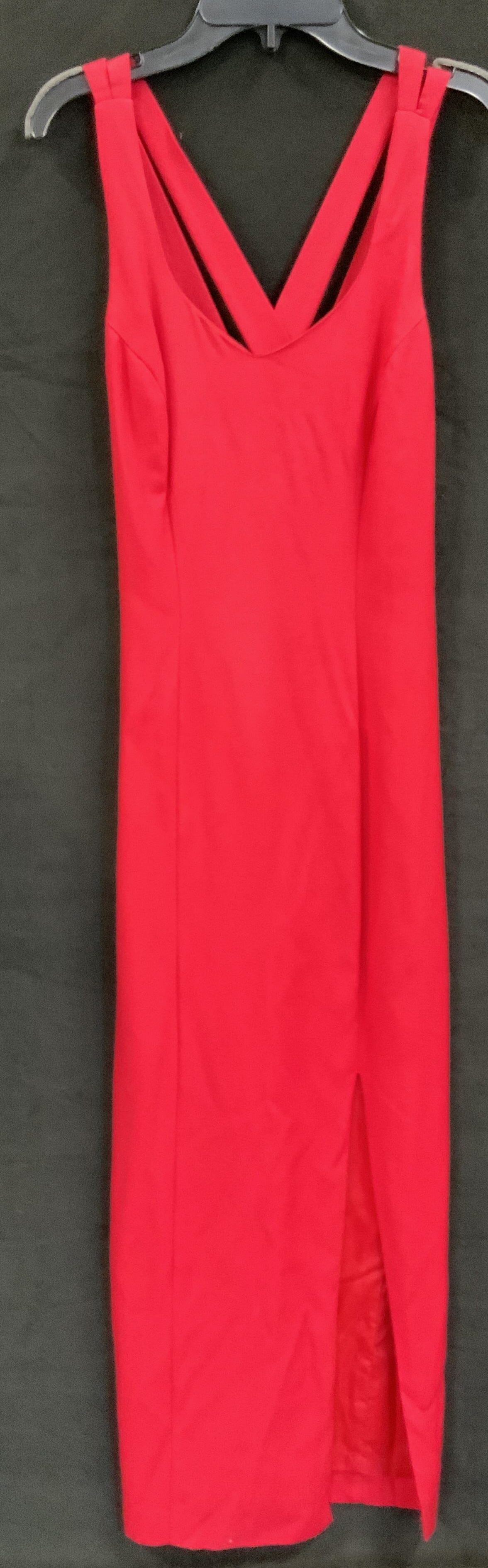 Vntg CDC Red Cross back maxi dress 1980s USA: Vintage Caren Desiree company red cross back maxi dress. Made in the 1980s in the USA. Size 4. Vibrant red evening gown featuring a striking v neckline and high leg slit. It also has a back zipper clo