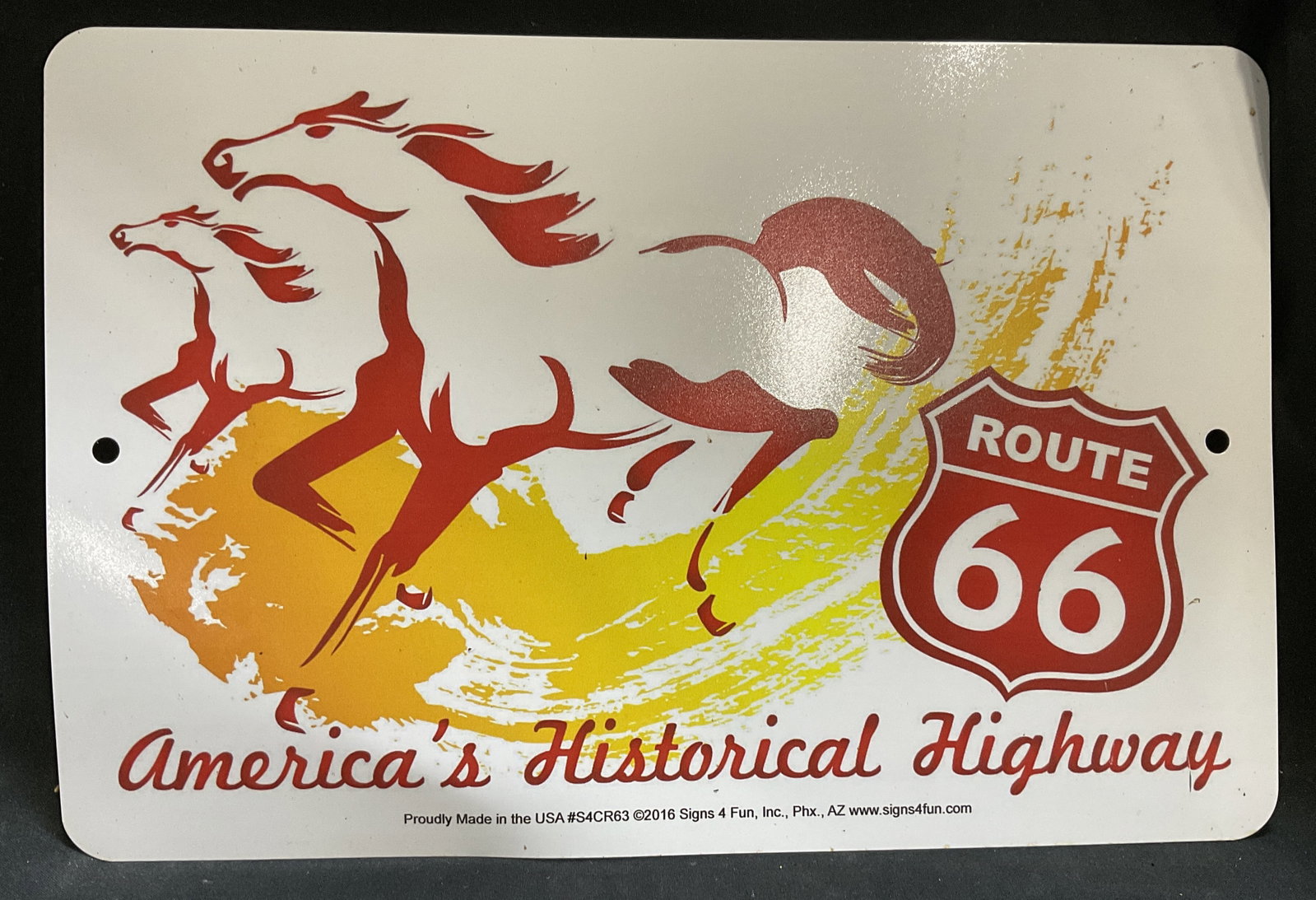 Vintage-Style Route 66 Horse Graphic Tin Sign USA: Vintage-Style 2016 Signs for Fun Inc Route 66 Tin Sign. Reads Americas Historical Highway. Red Galloping Horses Graphic. Made in USA. Bending Present. Measures app 8in H x 12in L. Vintage-Style, Route