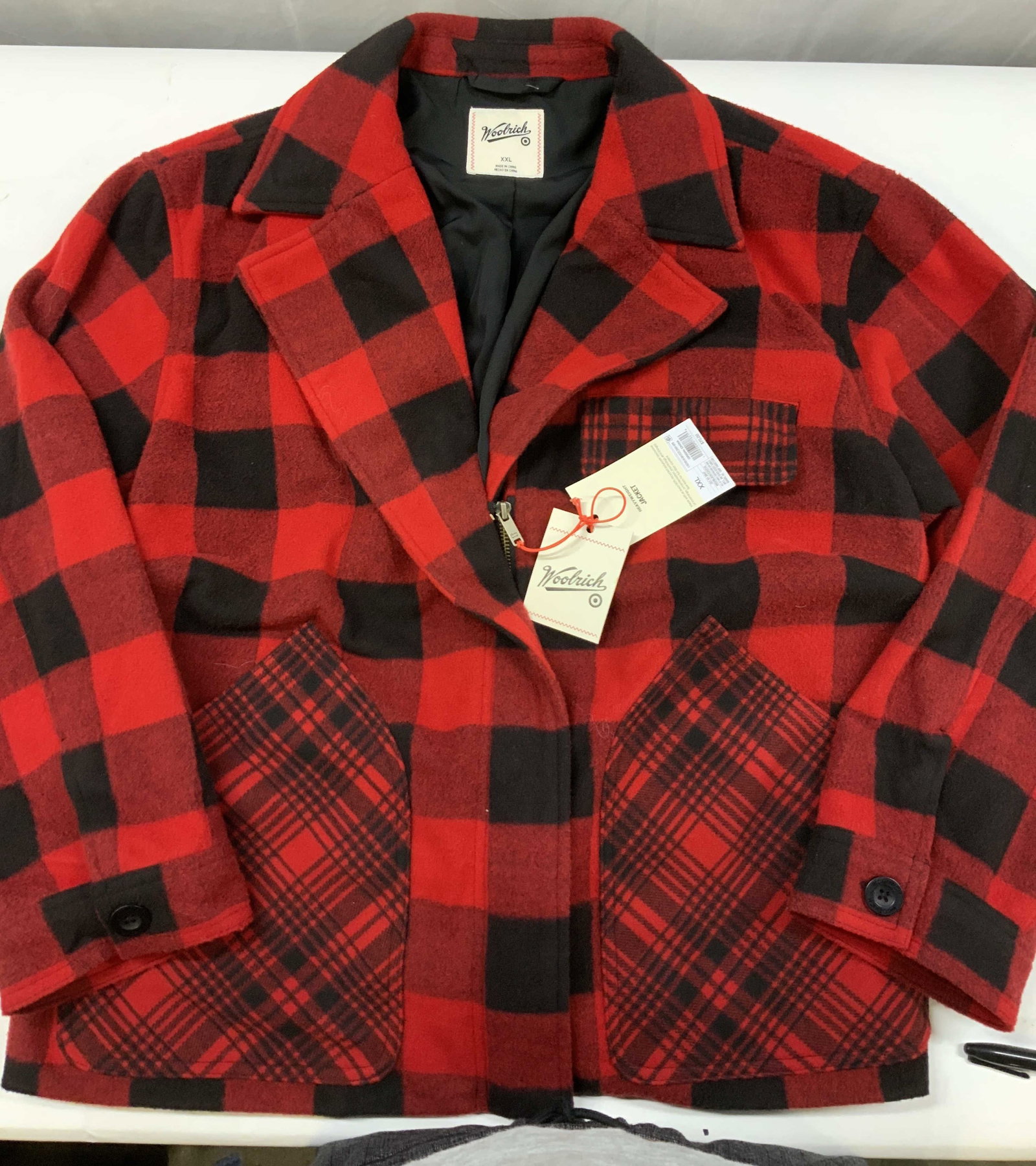 Woolrich red and black plaid jacket 2025 NWT: Woolrich red and black plaid jacket. New With Tags Released in 2025 in a Woolrich X Target collaboration line. Made of 100% polyester. Size XXL. Features classic red and black buffalo plaid a style in