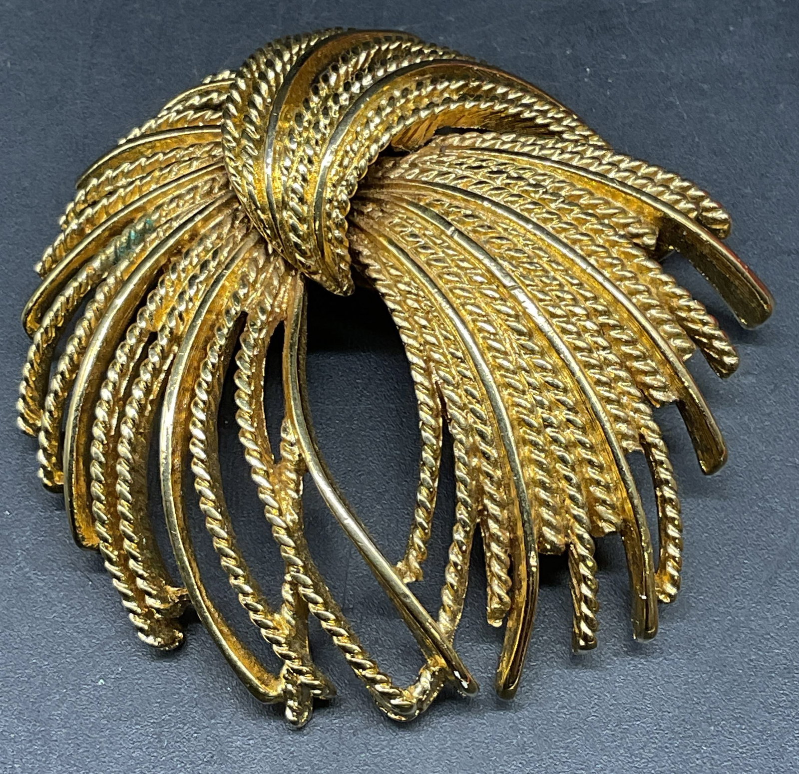 Vintage Monet Gold Plated Mirador Brooch: Vintage signed Monet gold plated Mirador brooch. Starburst/firework motif. Measures approx. 2 x 2 inches. Some scratching. Jewelry, estate jewelry, costume jewelry, cocktail jewelry, fashion jewelry, 