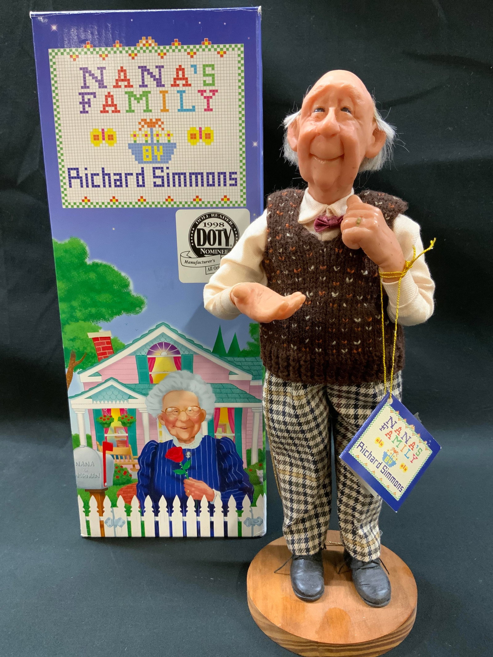 Vtg 1998 Nanas Family Norman Doll IOB: Vintage 1998 Norman doll from the Nanas Family collection. Presented by Richard Simmons, designed by Annie Wahl for The L.L. Knickerbocker Co. Elderly balding man in hand knitted patterned vest, long 