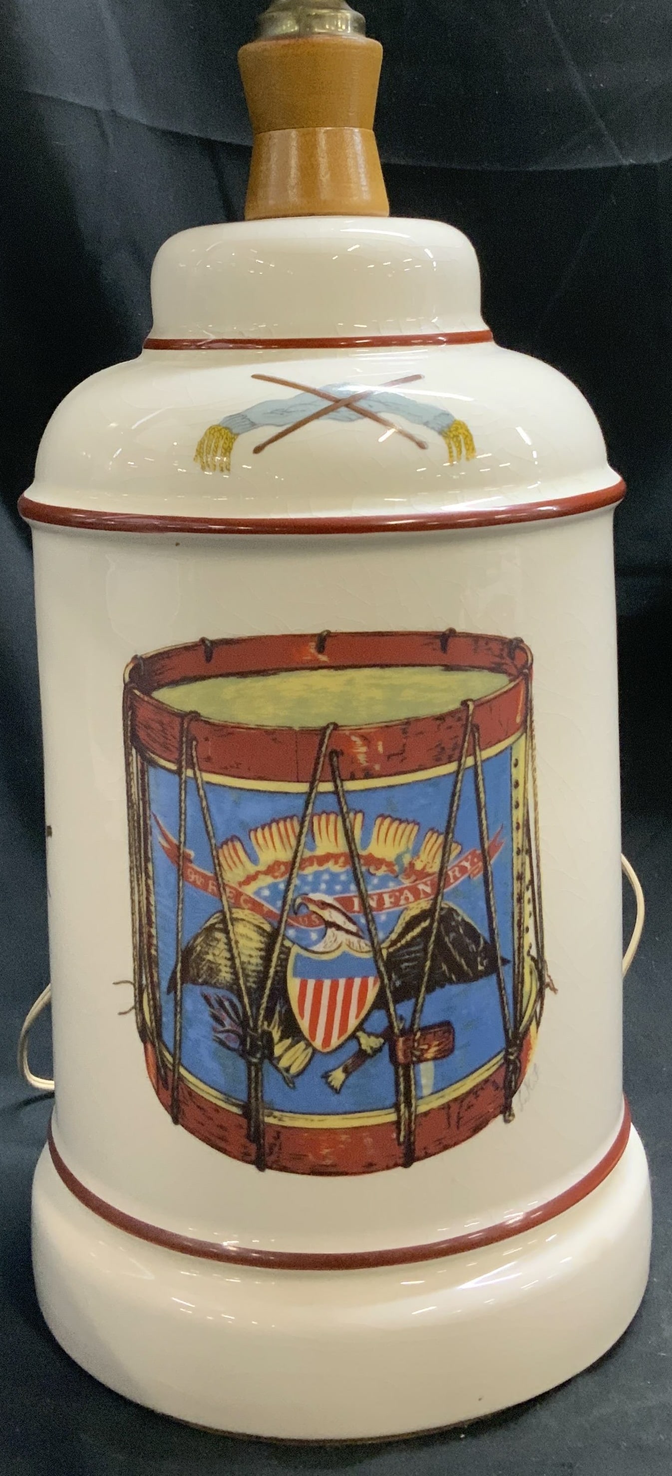 Vtg American Patriotic Ceramic Table Lamp: Vintage ceramic table lamp feature a white glazed body & decorated with American patriotic graphics. Eagles, swords, drum etc. Hand painted details. No visible signature or markings. Surface wear cons