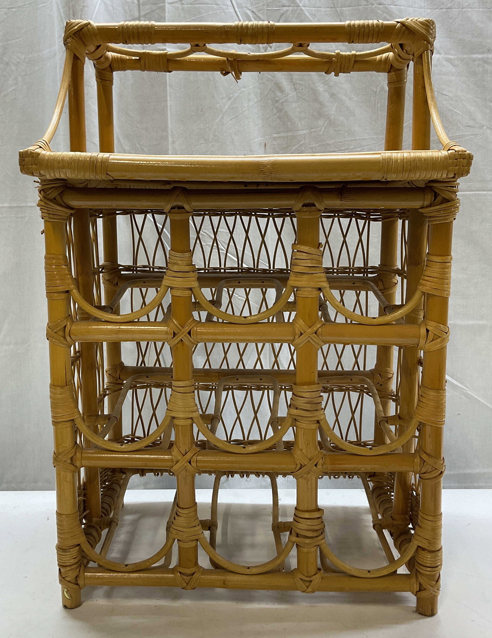 Vtg Bent Bamboo & Wicker Table Top Wine Rack: Vintage bent bamboo and wicker table top wine rack. Interior compartments to hold wine bottles, top compartments. Top carry handle. Geometric design. Measures approx 11 x 15 x 23.5 inches. Surface wea