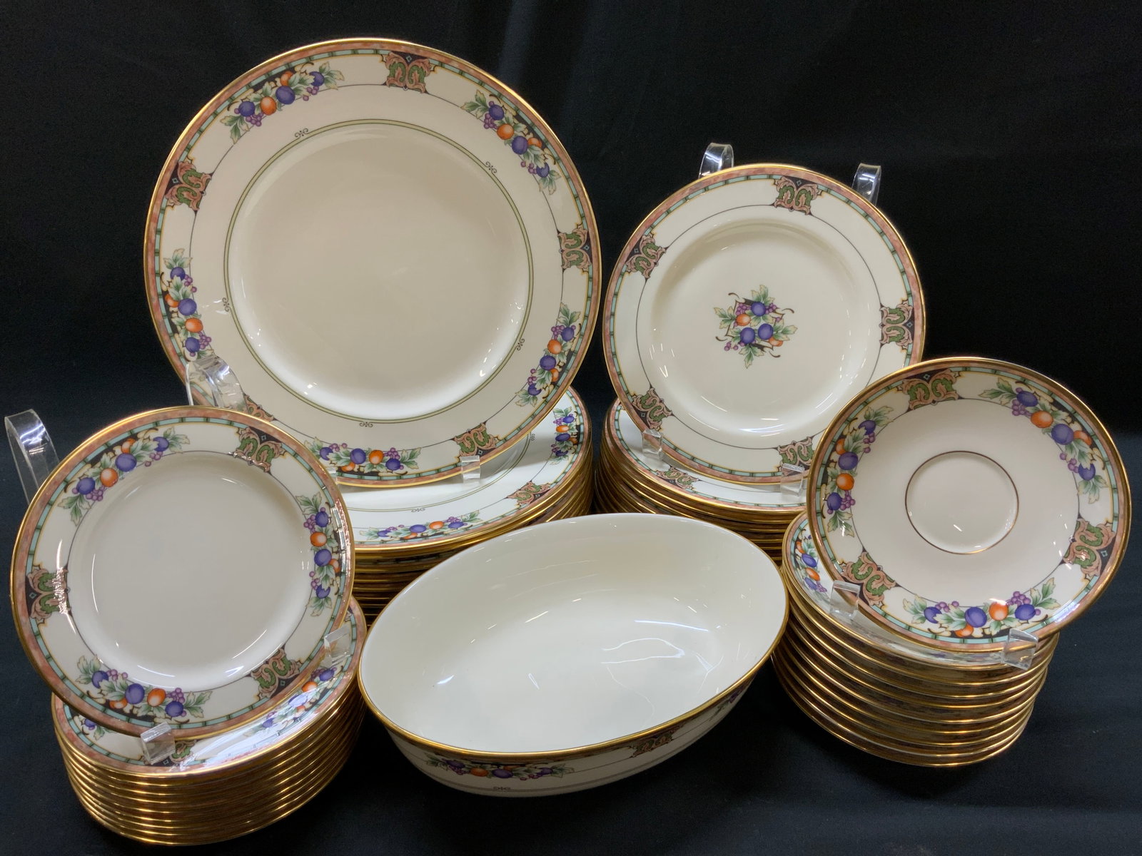 Vtg Lt41 Lenox Orchard Fine China Dinnerware Set: Vintage Lot of 41 Lenox Orchard Fine China Dinnerware Set c. Mid 1990s. Tuscan Orchard pattern features ivory china base decorated with border of purple plums, orange apricots, berries, and tan scroll