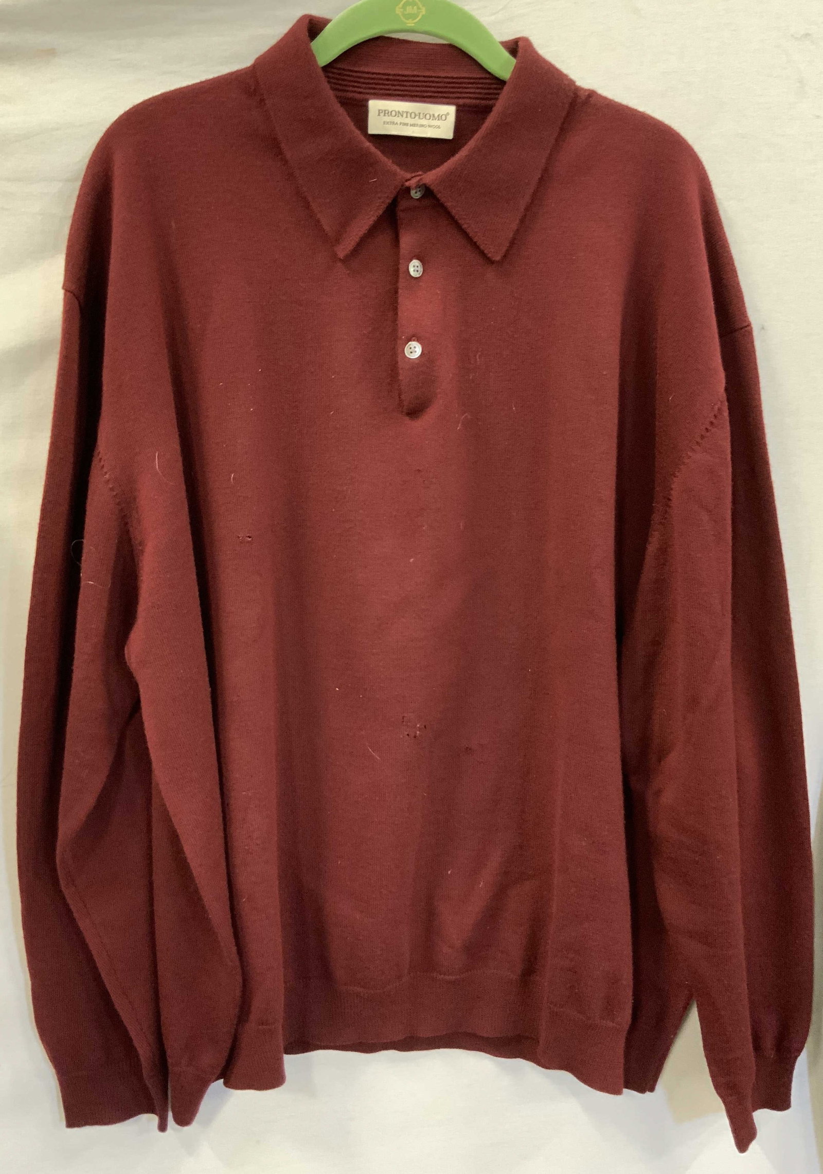 Vntg Pronto Uomo wool polo sweater Italy: Vintage Pronto Uomo long sleeve polo sweater. Made in Italy form100% wool in a bugebdy color . Features a classic 3 button placket and ribbed details long the cuffs , bottom hem , and neckline. No siz