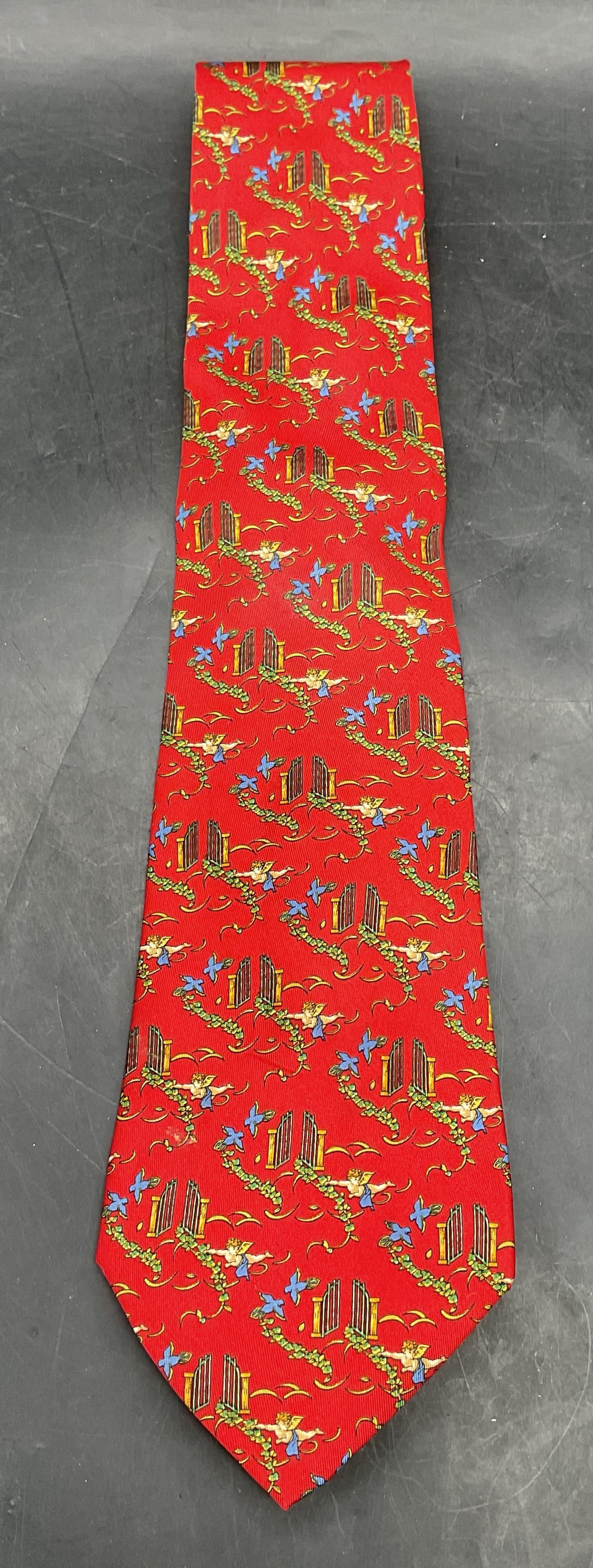 Salvatore FERRAGAMO Red Silk Heaven Tie Italy: Salvatore FERRAGAMO red silk tie with whimsical heaven pearly gate cherub print. Made in Italy. Measures approx. 56 inches. Some wear consistent with exposure. Salvatore FERRAGAMO tie, designer tie, c