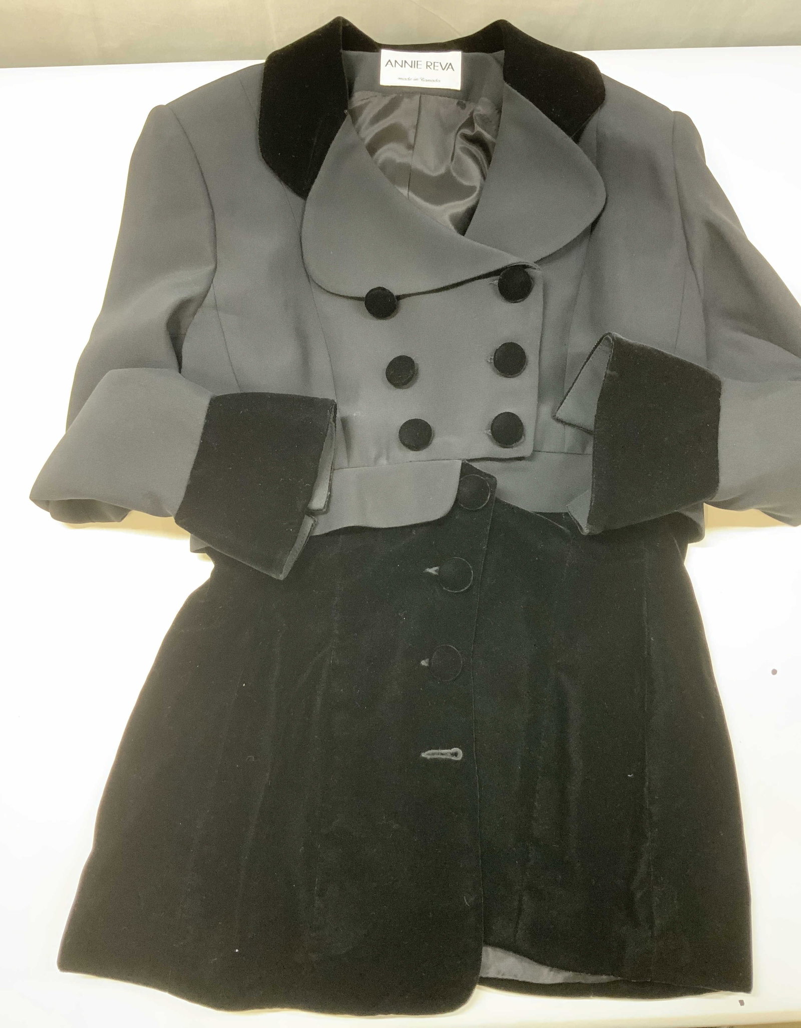 Vntg Annie Reva mixed media jacket 1980s: Vintage Annie Reva mixed media jacket. Made in Canada in the 1980s. Made from an acetate rayon blend fabric from Italy. Features a cropped blazer with velvet layered as the bottom portion as well as