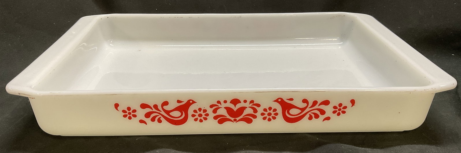 VTG Pyrex Friendship Pattern Lasagna Pan: Vintage White Opal Glass Pyrex Lasagna Pan with Red Bird and Floral Friendship Pattern. Scratching, Staining, and Residue Present. Measures app 2in H x 15.25in L. Vintage Pyrex, Opal Glass, Lasagna