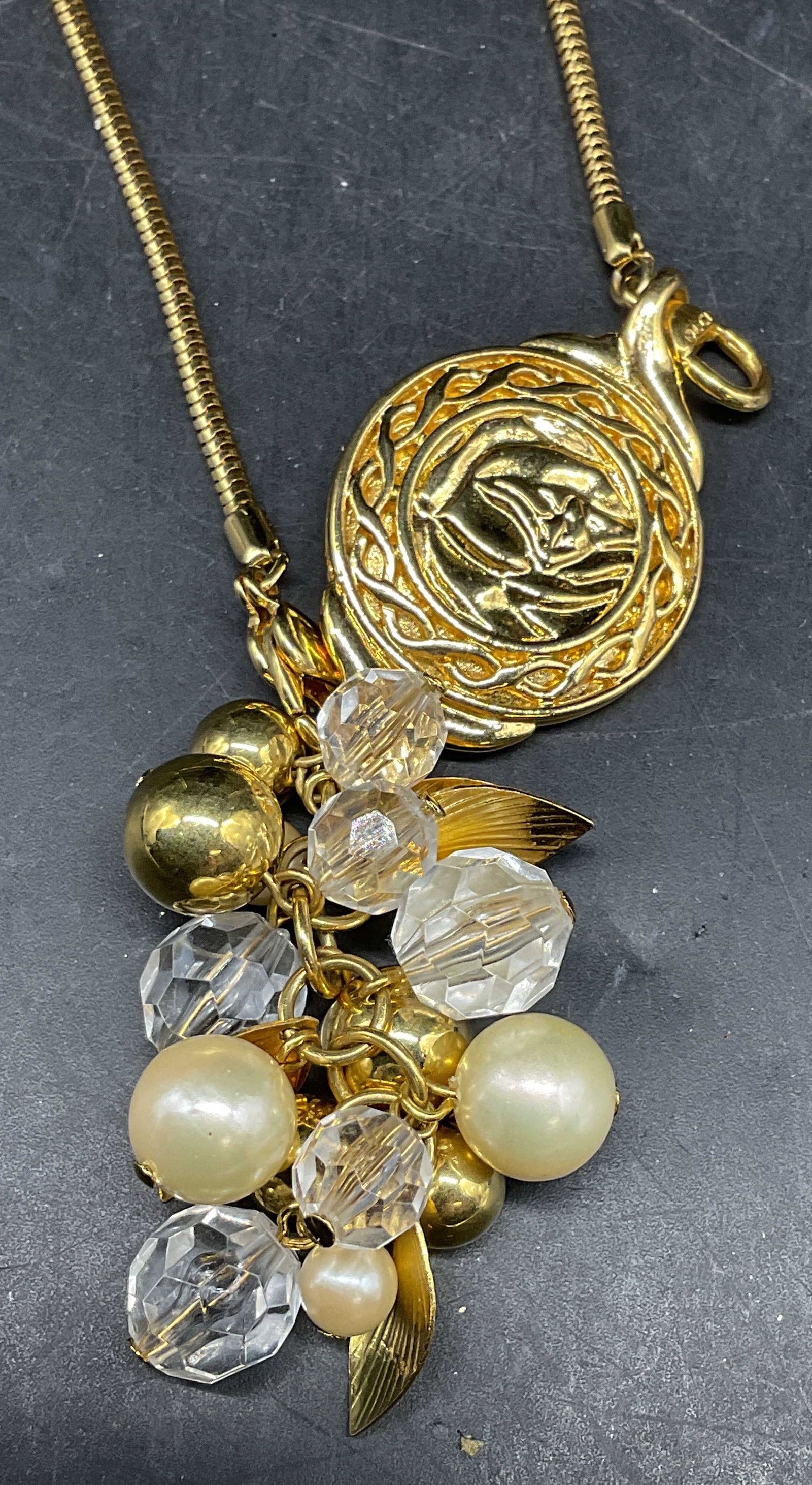 Liz Claiborne Gold Tone Pendant Necklace: Vintage Liz Claiborne gold tone flower, faux pearl pendant necklace. Drop length 17.5 inches. Some scratching. Jewelry, estate jewelry, costume jewelry, cocktail jewelry, fashion jewelry,