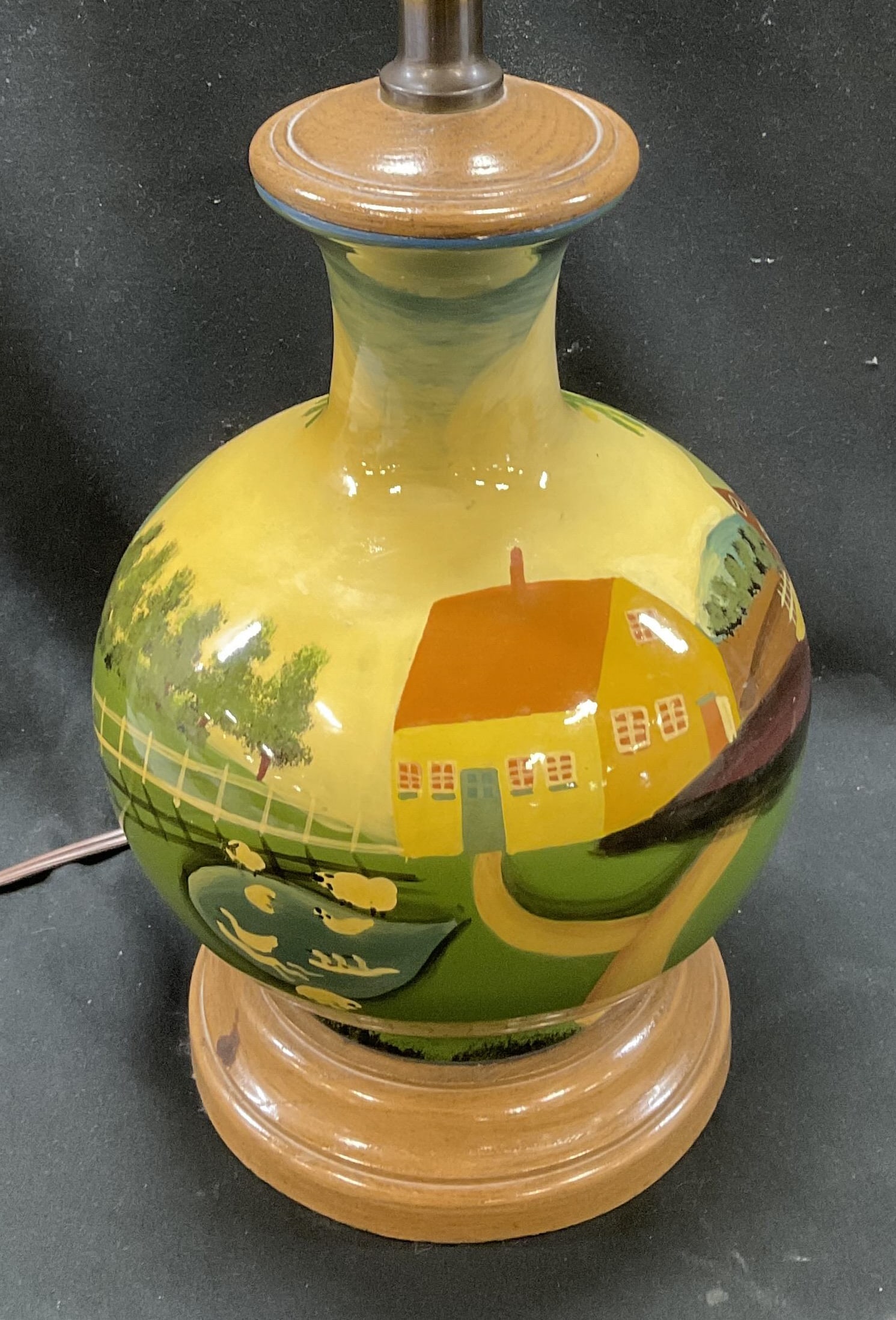 VTG Reliance Lamp Co Pntd Ceramic Cottage Lamp: Vintage Reliance Lamp Co Hand-Painted Ceramic Country Cottage Lamp. Bulbous Base Hand-Painted with Cottages, Trees, Fence, Sheep, and Ducks in a Pond. Condition Consistent With Exposure. Not Tested