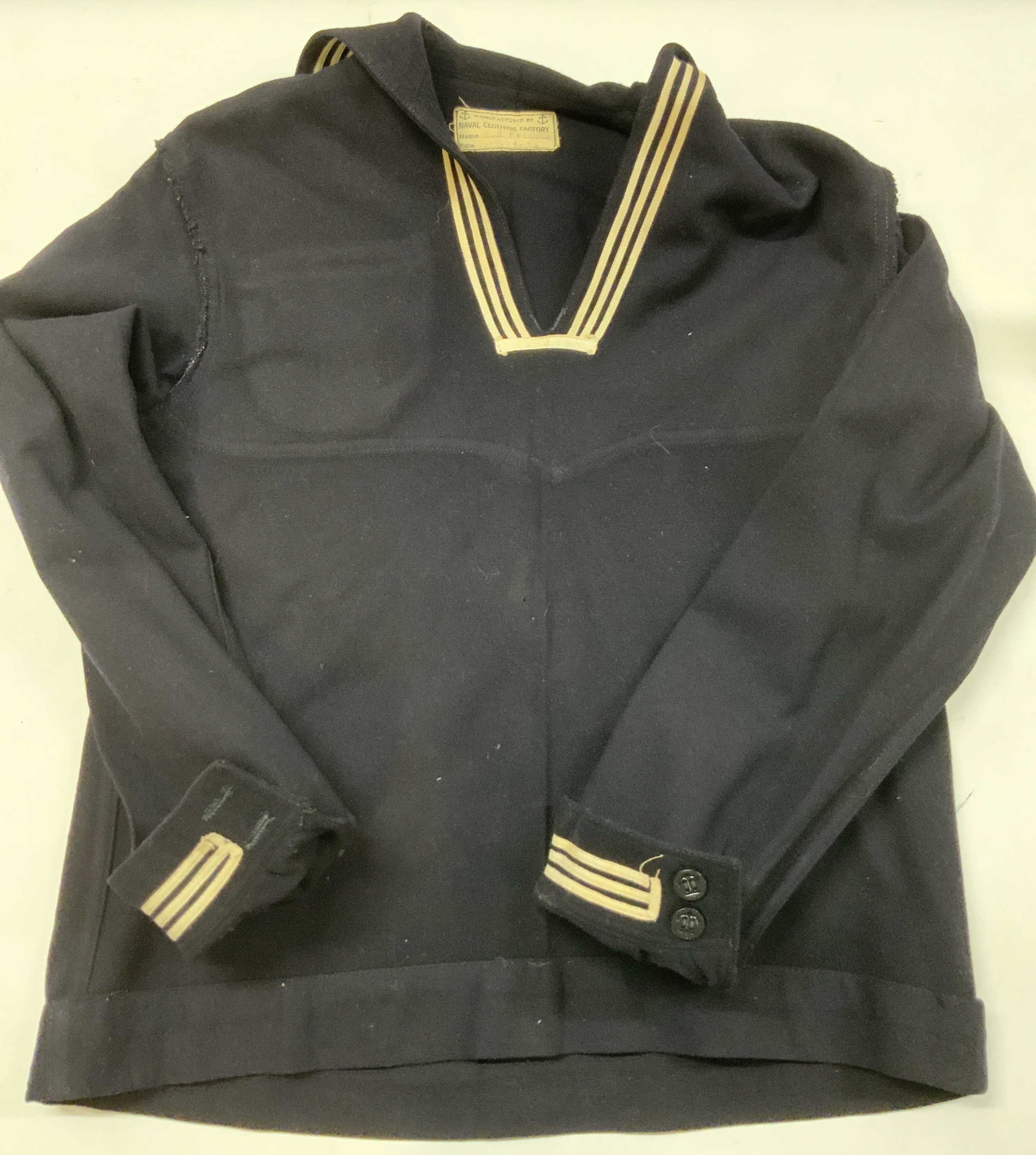 Vntg sailor jumper and trouser set. 1940s USA: Vintage sailor jumper and trouser set. Set actually cones with 2 pairs of the same pants. Made in the 1940s from 100% wool in the USA. Pants from closure is a 13 button broad fall, indicating the 13
