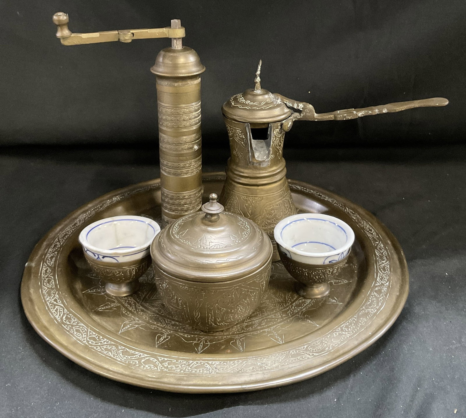 VTG 6PC Middle Eastern Coffee Set: Vintage Etched Brass 6 Piece Middle Eastern Coffee Set. Hexagram, Geometric Patterns, and Stylized Arabic Calligraphy Motifs. Includes Serving Tray, Long-Handled Coffee Pot, Hand-Crank Coffee Grinder,