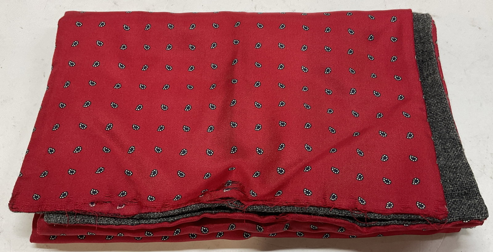 Vintage Silk & Wool Red Floral Scarf: Vintage silk and wool red floral scarf. Red background with blue and white floral motifs. Dark grey back. Measures approx 10 x 50 inches. Blemishes and holes. Scarf, wearables, clothing, outerwear, fa