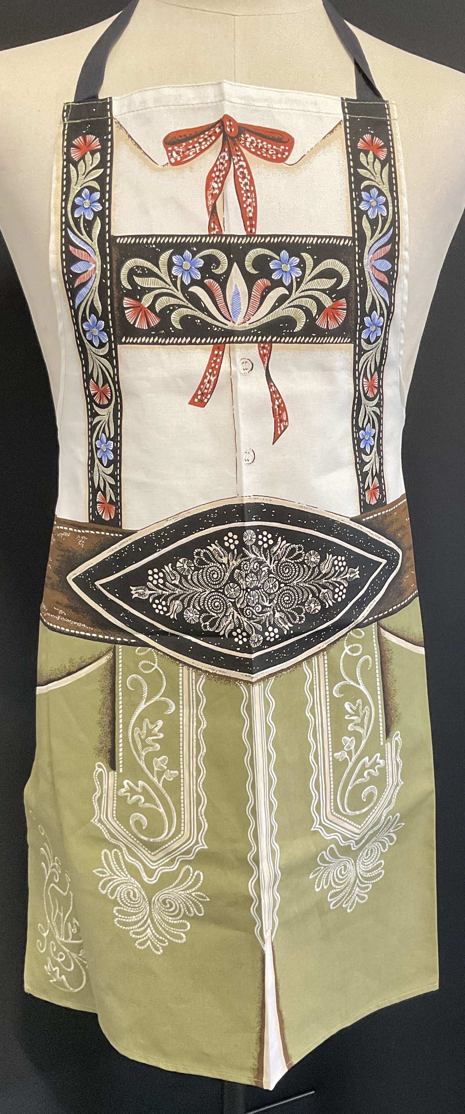 VINTAGE German Alpine Style Apron: Vintage German Alpine Style Apron. Tag Reads 100% Baumwolle (Cotton). Features a Blouse Design Top with Buttons and Red Bowtie. Black Floral Belt Band. Olive Green Skirt. Floral Patterns. Condition Co