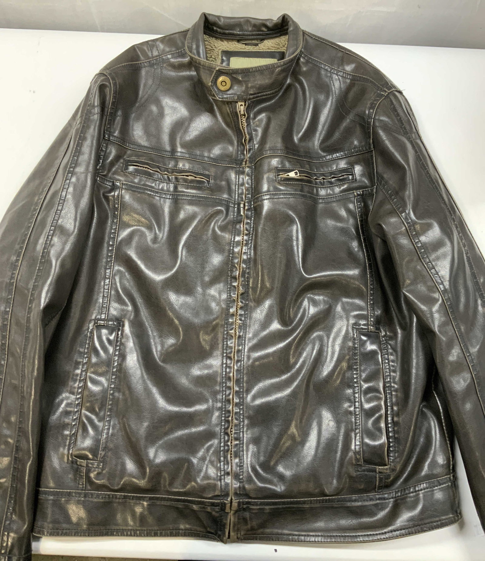 Vntg Sonoma faux leather motorcycle style jacket: Vintage Sonoma motorcycle style jacket. Made of a polyurethane blend to create faux leather and a polyester blend for the soft Sherpa lining. Size medium. Equipped with a full length metallic front zi