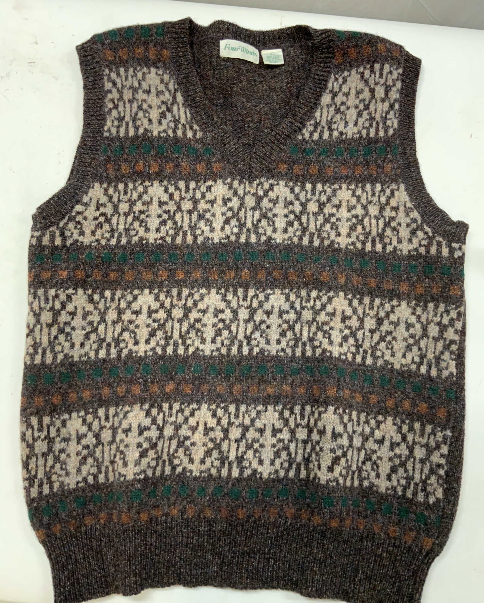 Vntg Four Winds fair isle wool sweater vest 1980s: Vintage Four Winds sweater vest. Made in the 1980s out of 100% Shetland wool. It embodies the grandad or old money golfing aesthetic. Horizontal repeating stripes are a signature of fair isle