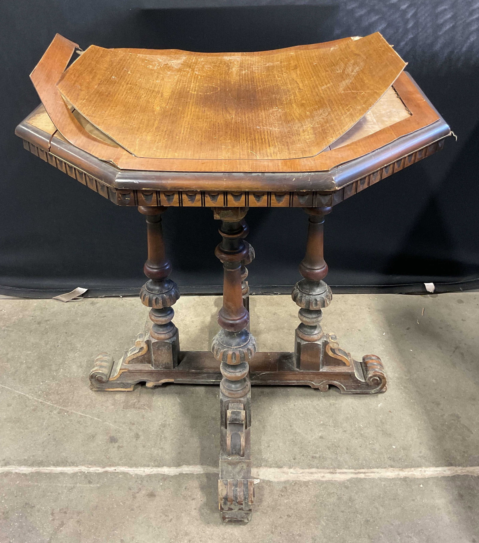 Regency Style Octagonal Wood Side Table: Regency style octagonal wood side table. Ornate carved legs with veneer top. Measures approx 30 x 30 x 31 inches. Wear including losses and warping to veneer. Scratching and splitting. Regency style t