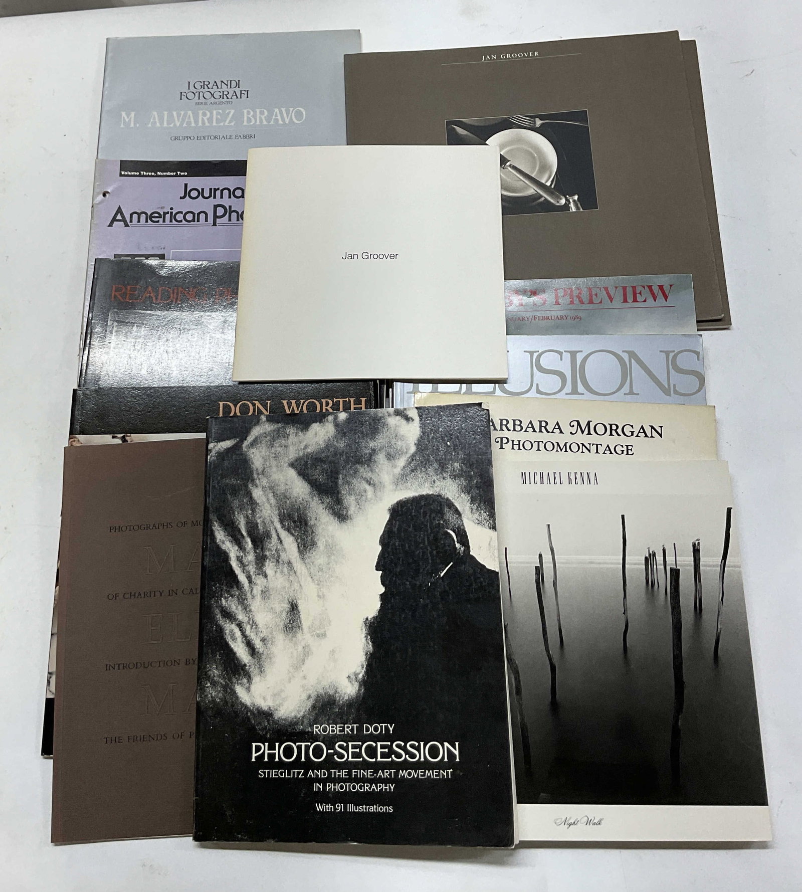 Group Lot 13 Photography Art Books 1900s: Group lot of 13 photography art books. All published in the 1900s. Soft cover with illustrated covers. Contains illustrations. Artists include Jan Groover, Ronald Caplain, Don Worth, Manuel Alvarez Br
