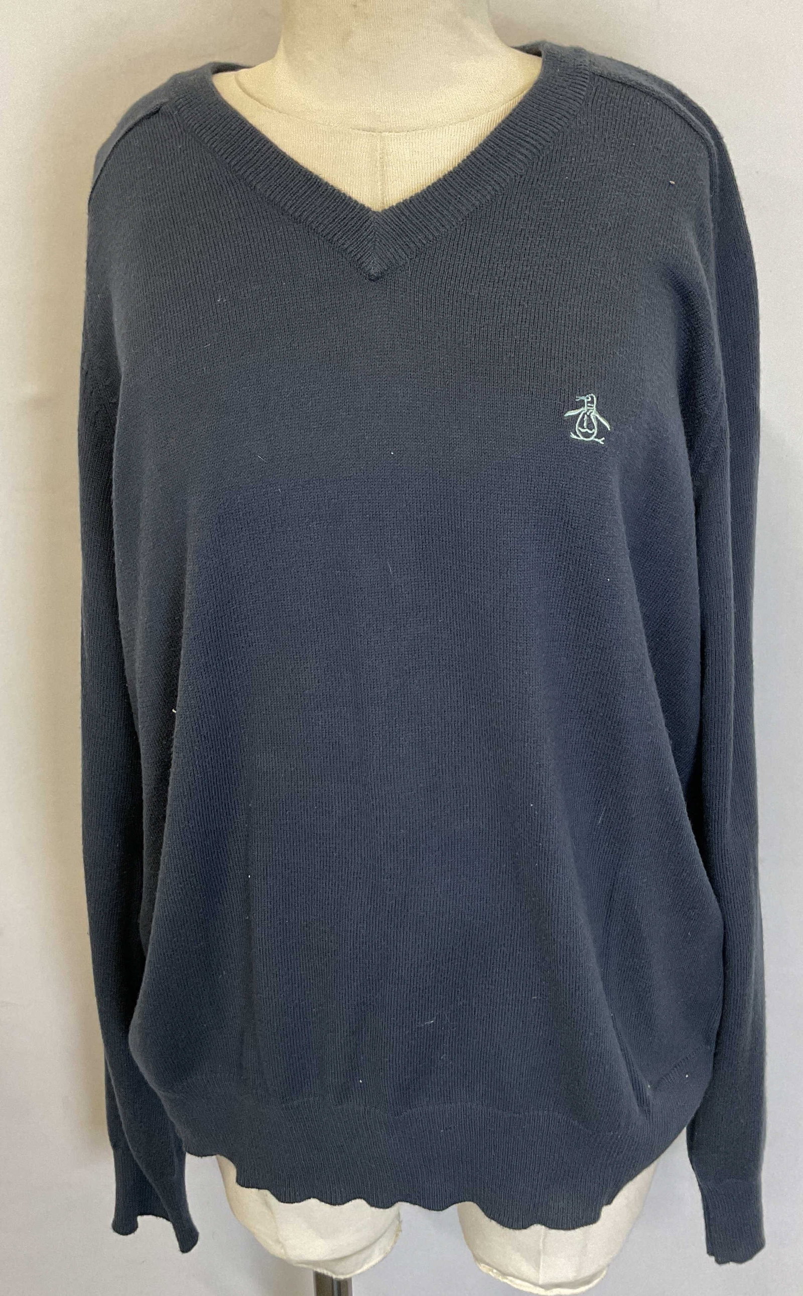 Penguin Munsingwear Blue Sweater Hong Kong: Penguin Munsingwear blue sweater. Made in Hong Kong. 85% cotton 15% cashmere. Size XL. Tag reads An Original Penguin By Munsingwear. Ribbed trim. Long sleeve sweater. Embroidered logo. Surface wear co