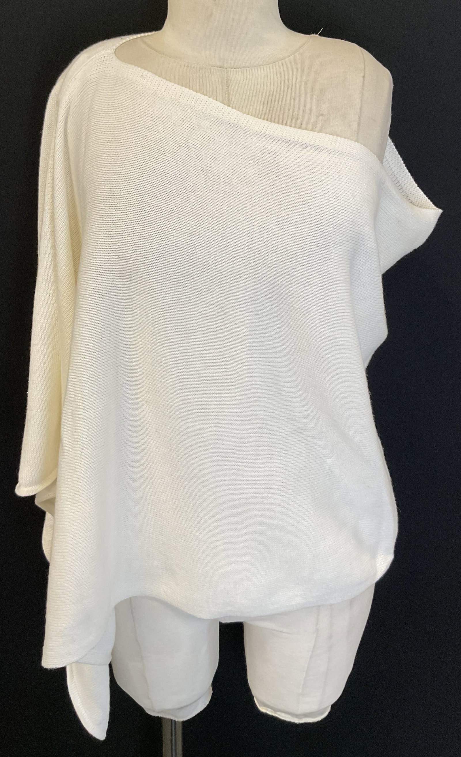 Caroline Grace White Off The Shoulder Sweater: Caroline Grace white off the shoulder sweater. 95% cotton 5% cashmere. Wavy design. Off the shoulder wear. Measures approx 31 inches across chest. Wear consistent with exposure. Slight blemish. Sweate