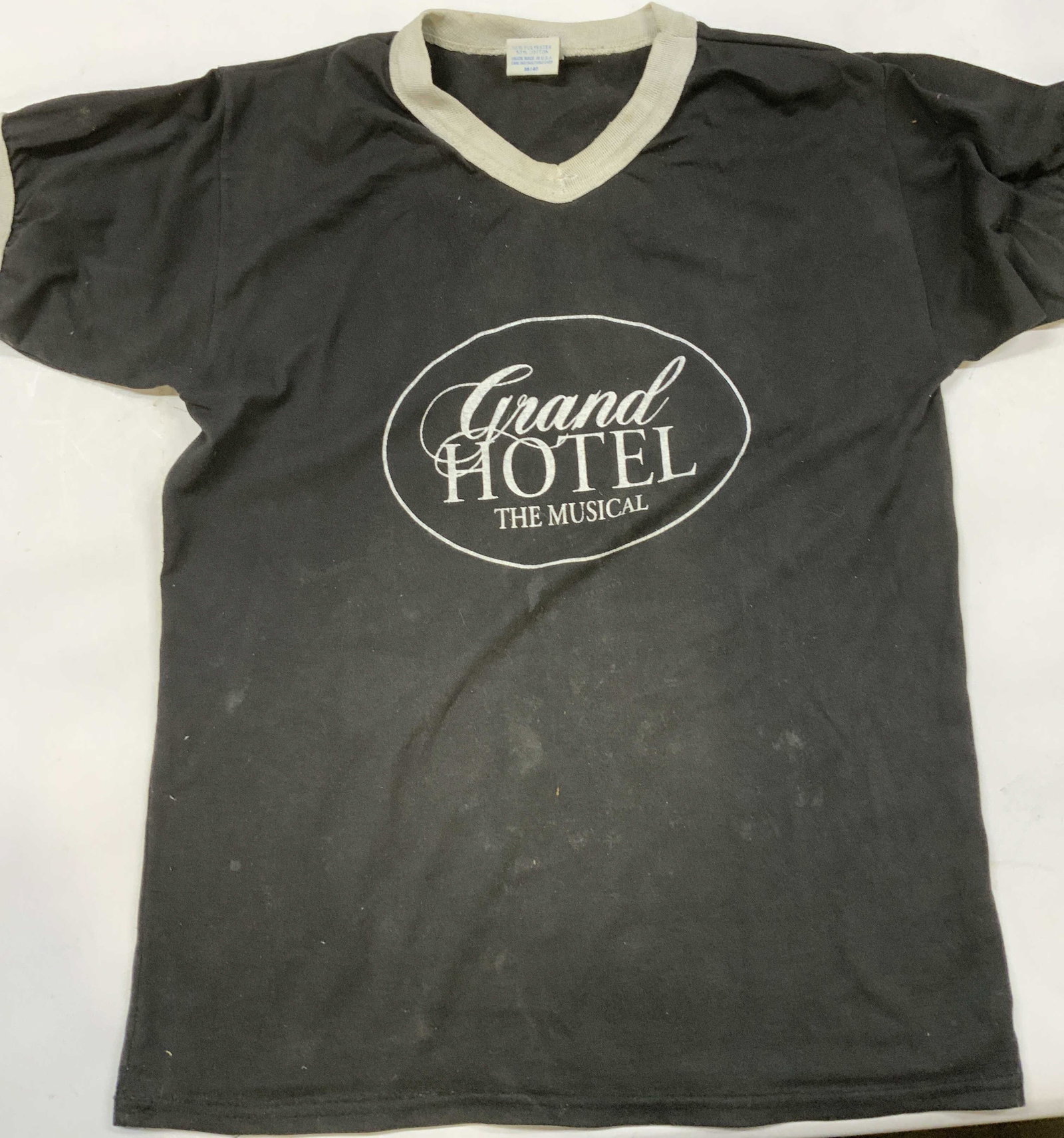 Vntg Grand Hotel The Musical t shirt USA 1990s: Vintage Grand Hotel The Musical t shirt. Union made in the USA from a cotton polyester blend. Size 38/40 Made in the 1990s when the show first started on Broadway. It features a rare contrasting ringe