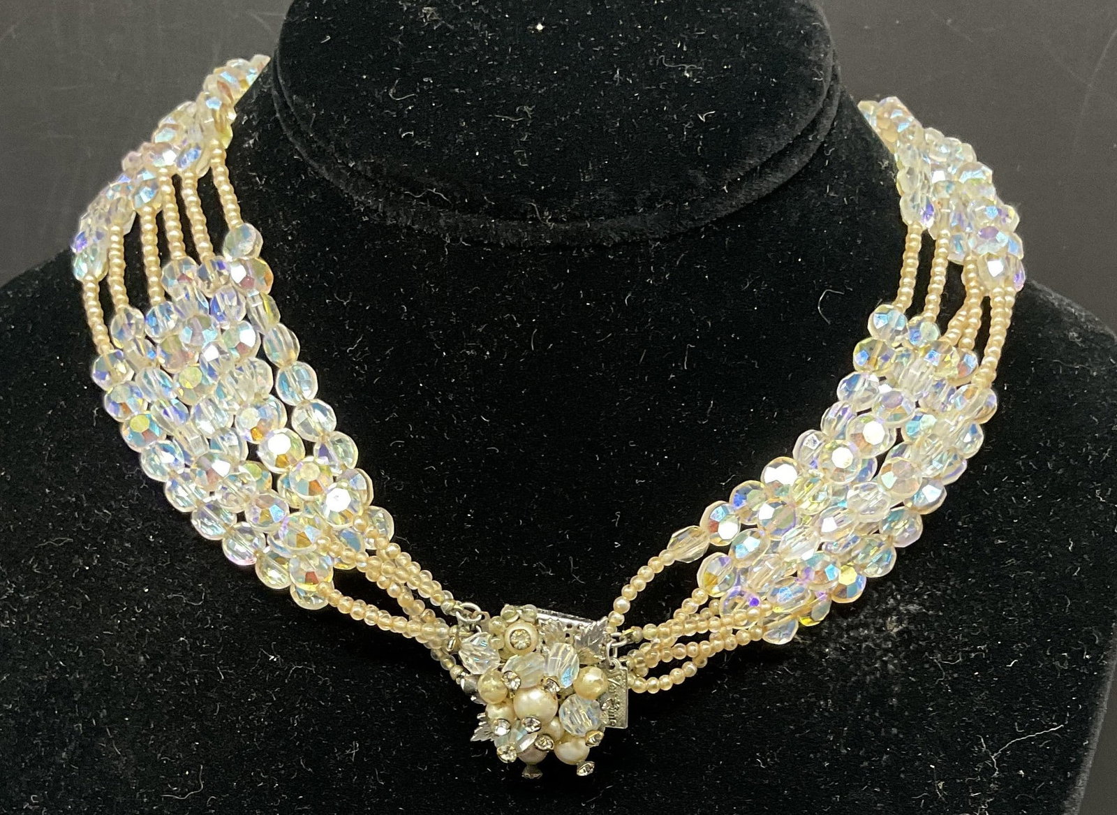 VTG Vendome Aurora Borealis Crystal Necklace: Vintage Circa 1950s-1960s Vendome Aurora Borealis Crystal Beaded Multi-Strand Necklace. Small Glass Beige Beads. Silver-Toned Cluster Box Clasp Embedded with Faux Pearls and Crystal Beads. Some Tarnis