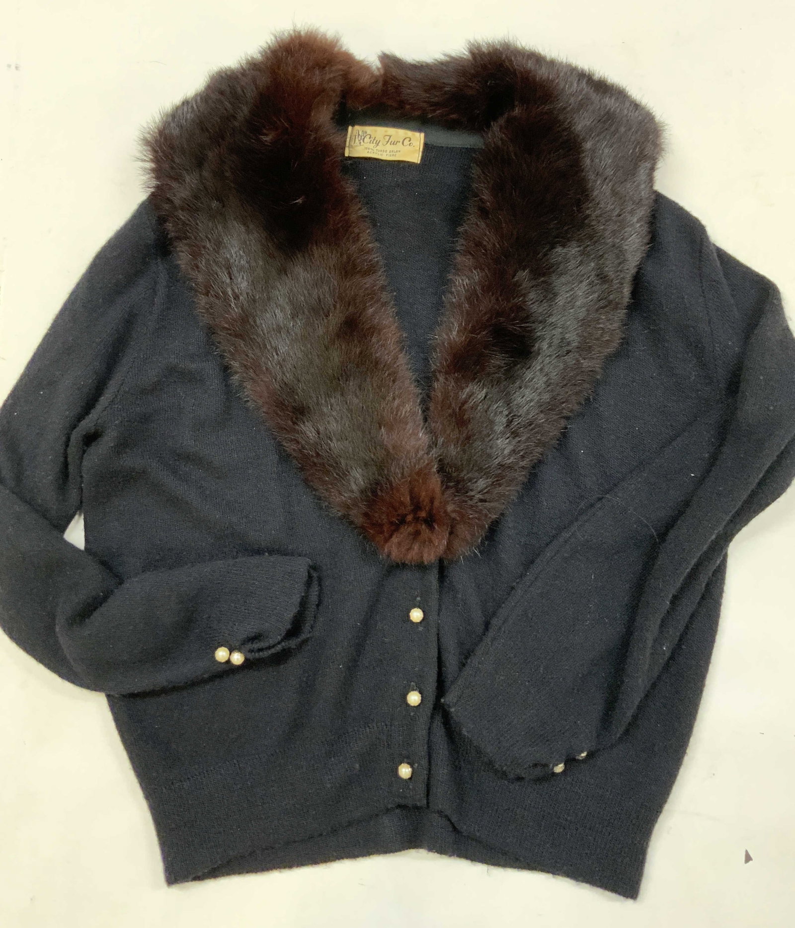 Vntg City Fur Co fur collar cardigan 1950s: Vintage City Fur Co fur collar cardigan. Made during the 1950s. Made from100% Turbo Orlon acrylic Fibre, witch was highly prized at the time for its softness, lightweight feel, and resistance to