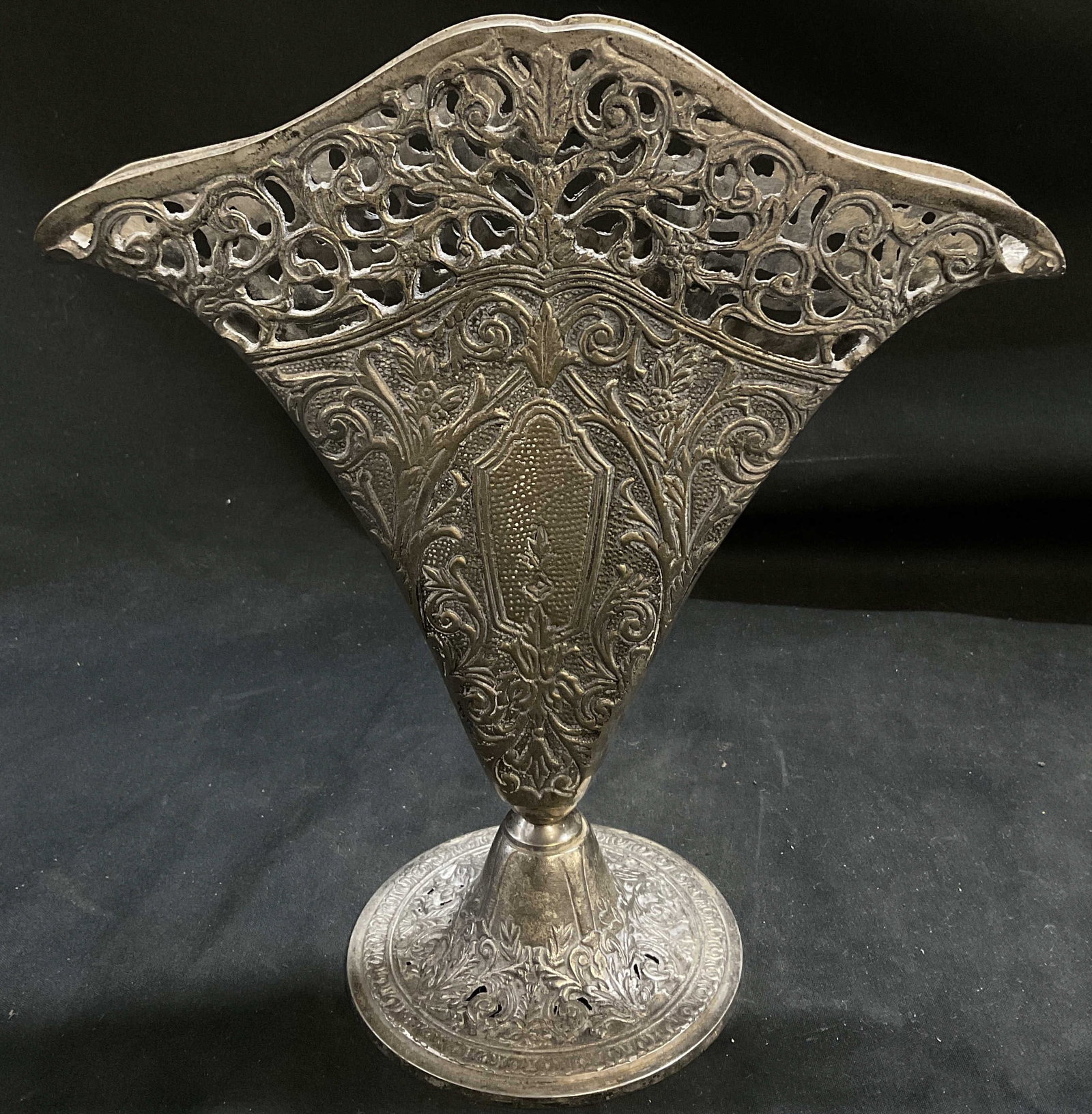 VTG Slvr-Pltd Victorian-Style Filigree Fan Vase: Vintage Silver-Plated Victorian-Style Filigree Fan Vase. Pierced Lattice Design. Pedestal Base. Tarnishing and Plating Loss Present. Measures app 8.5in H x 8in Diam. Vintage Vases, Silver-Plated,