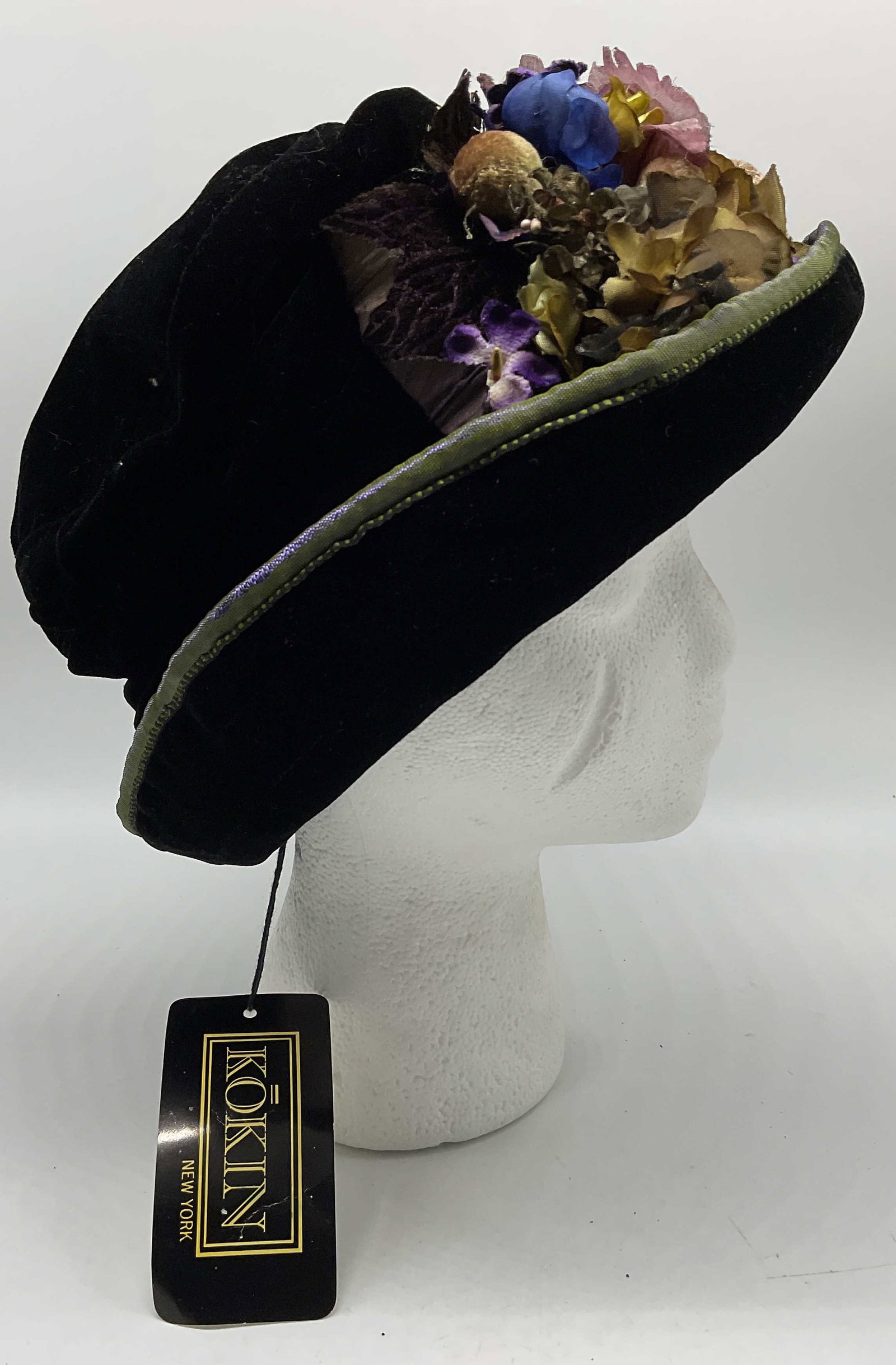 NWT VTG Kokin Black Velvet Floral Hat NY: New with Tags Vintage Circa 1980s-1990s Kokin Black Velvet Floral Hat. Style 3045. New York. Purple, Yellow, and Olive Green Velvet and Fabric Flower Accents. Metallic Green Satin Trim. Condition Cons