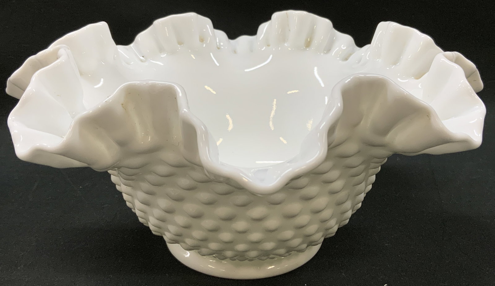 Vtg Fenton White Milk Glass Hobnail Bowl: Vintage Fenton White Milk Glass Hobnail Bowl. American art glass compote bowl manufactured by Fenton Art Glass Company. Crafted from opaque white milk glass, exterior features hobnail texture pattern.